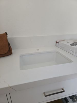 Moving Pipe and Installation of Toilet and Faucet.
