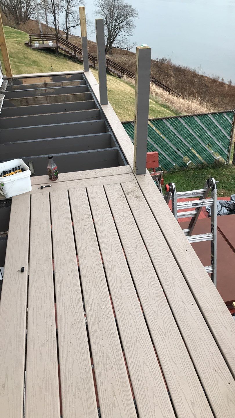 Deck Refurbush and Door Replacement using Trex Decking and Railing. Polaris Patio Doors by Secure Construction Company Inc