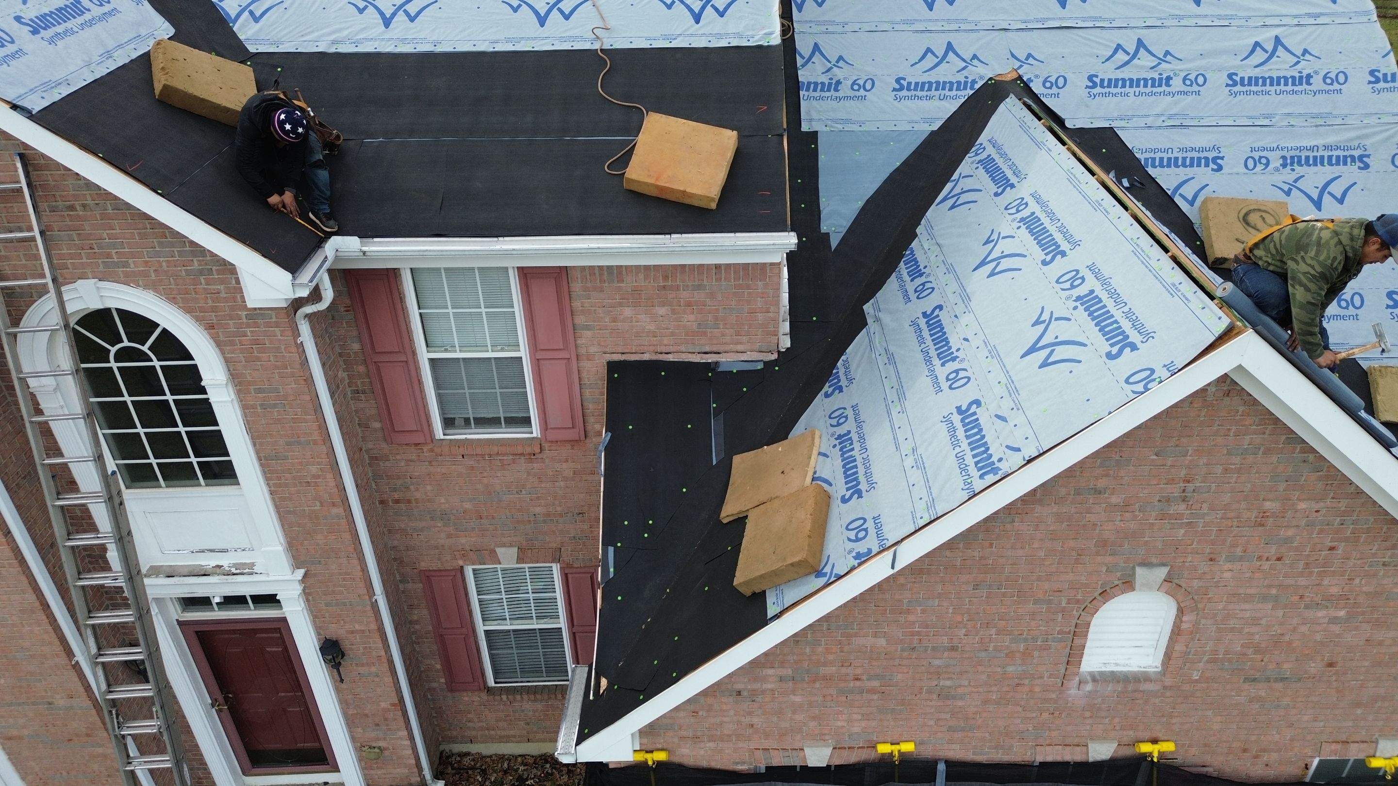 Walden Ponds - Pristine Black and Hydro Flo Gutter Guards by Tamlin Roofing