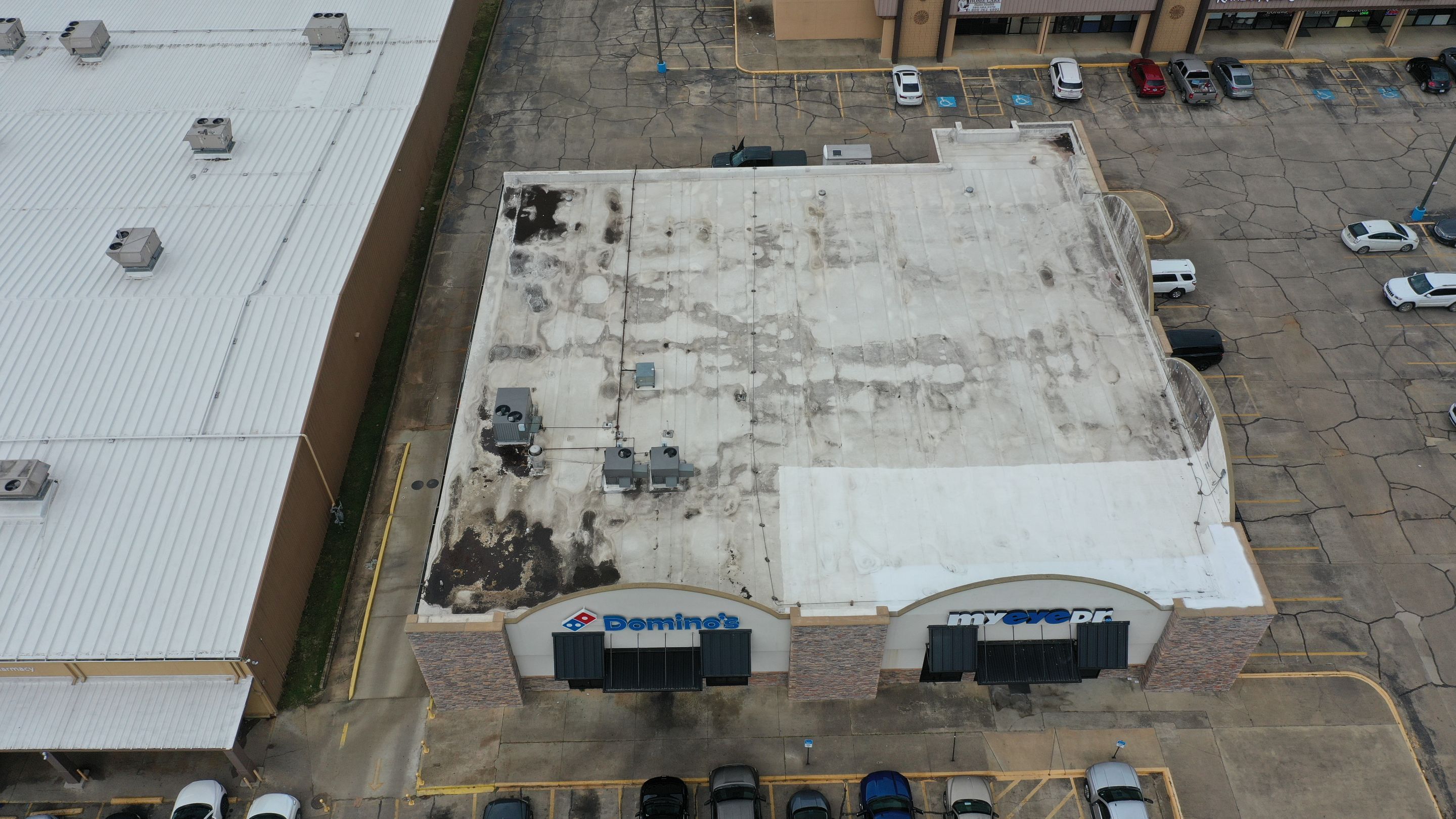 Commercial Roofing Installation using Aldocoat Coatings by Hostetler Roofing