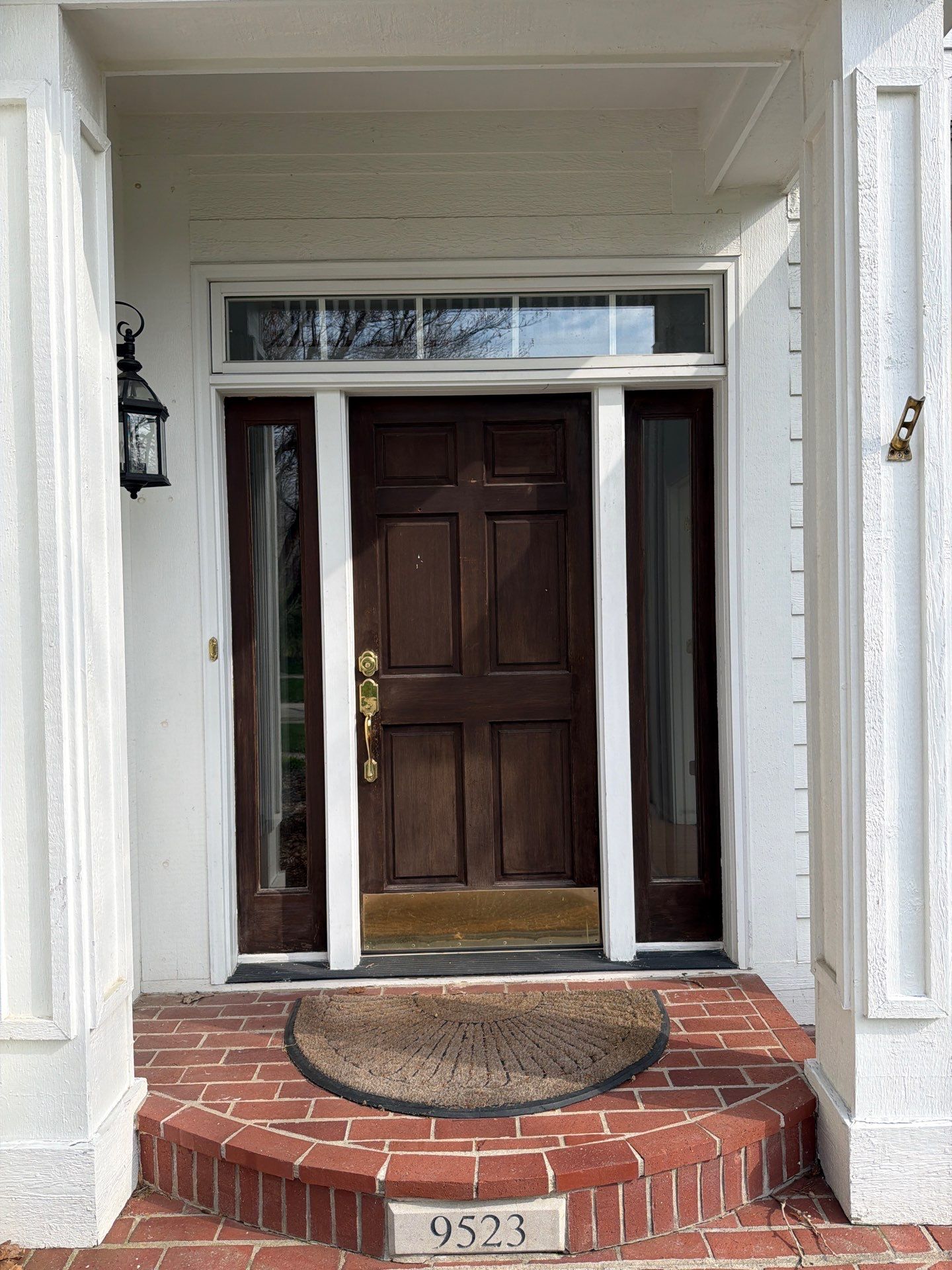 Fiberglass door with woodgrain by Blair Windows & Doors, Inc.