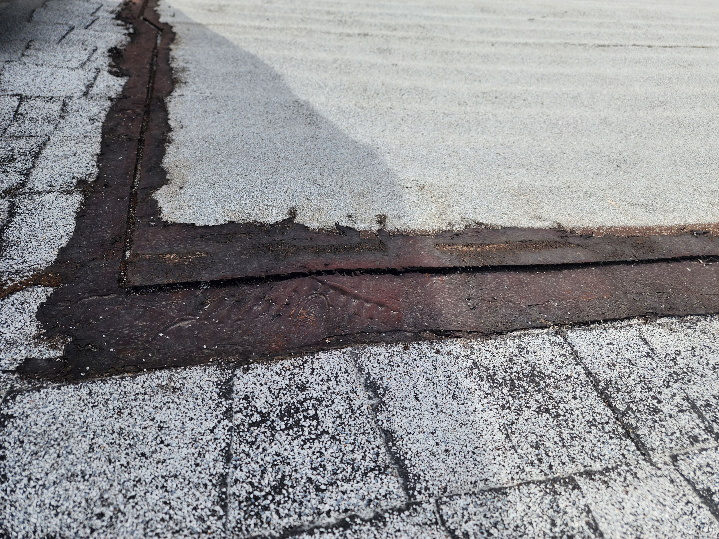 Foam and coatings on commercial roof by Straight Edge Roofing Inc