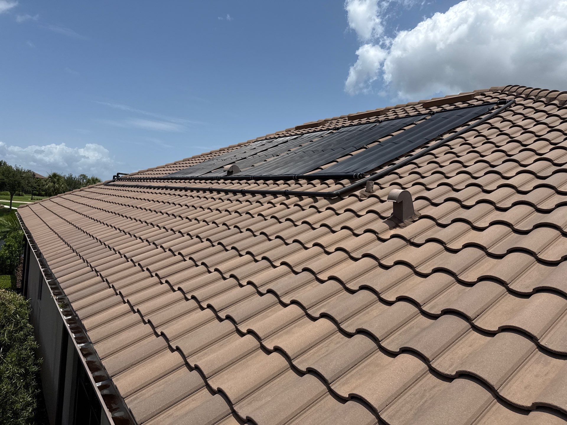 Neighboring Tile Roof Cleaning with Gutter Runoff Control – Palmetto, FL by Sunshine AquaWash