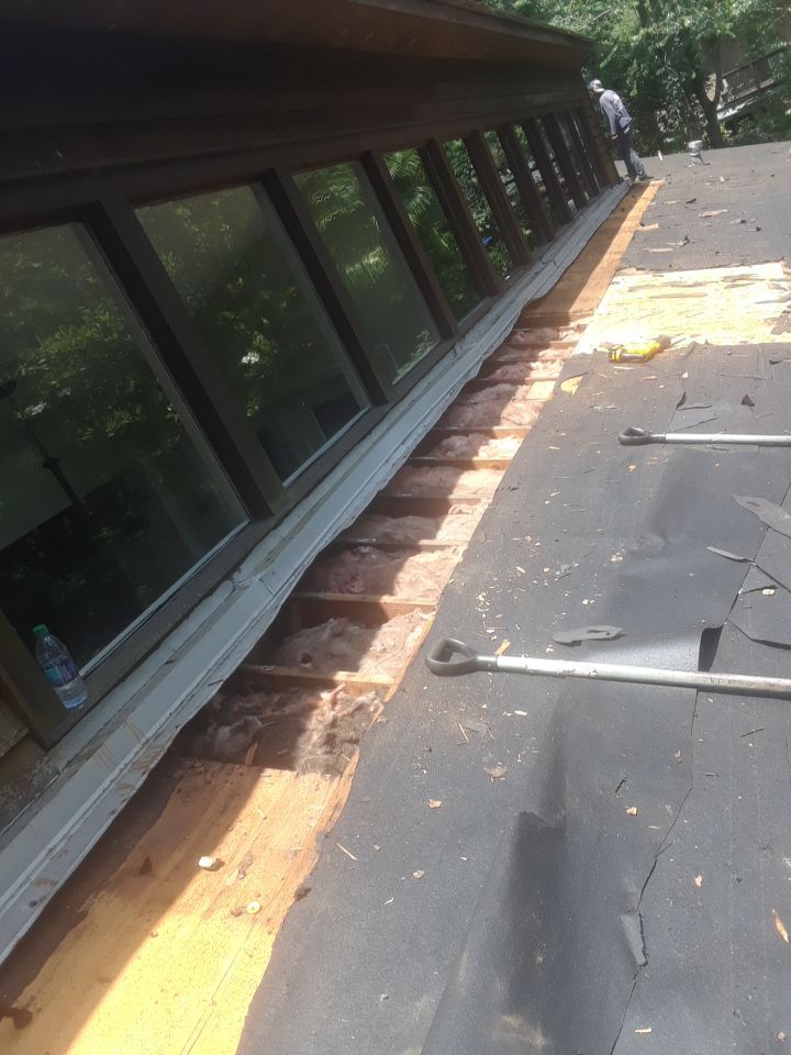 Commercial Roofing Installation using Roof Replacement by American Roofing & Construction LLC