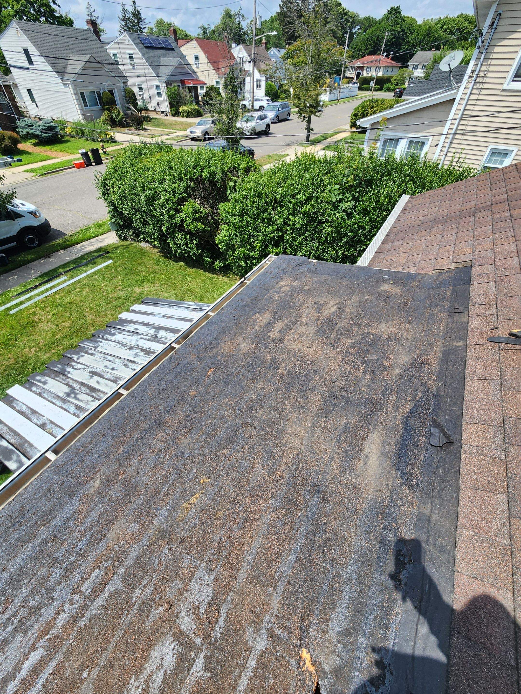 Partial Roof Replacement (Shingle to Flat Conversion) by Island Roofing Inc.