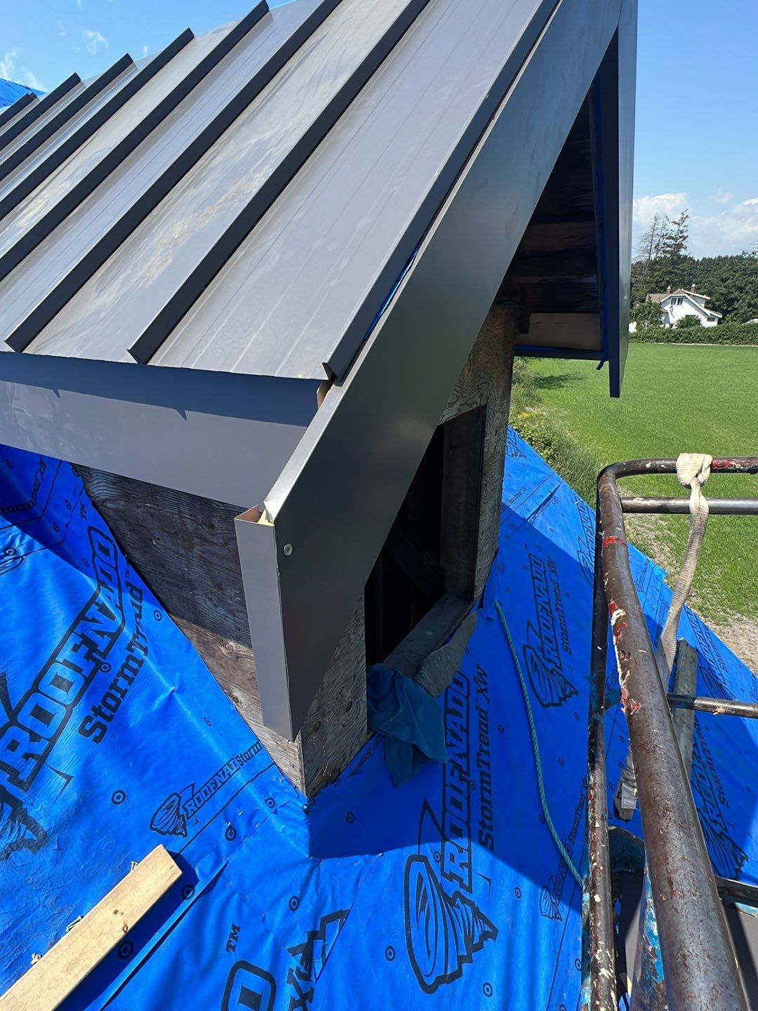 Agricultural Roofing Installation using 12" Prolok metal  by Top Notch Roofing Inc