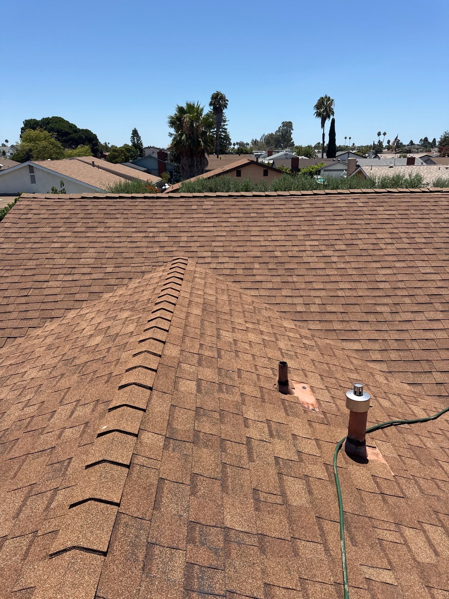 Asphalt Shingle Roof Rejuvenation and Vent Sealing in San Diego by Reliable Roofing San Diego Inc.