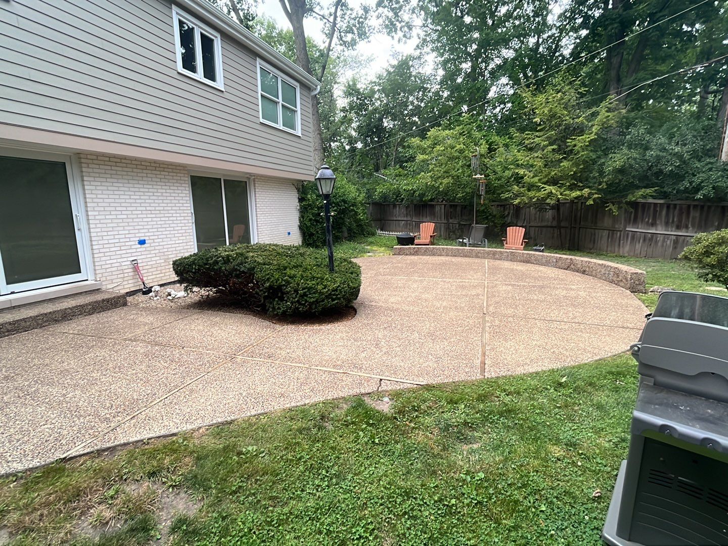 Aggregate concrete cleaning and sealing using Surebond SB-9000 by Northern Power Washing LLC.