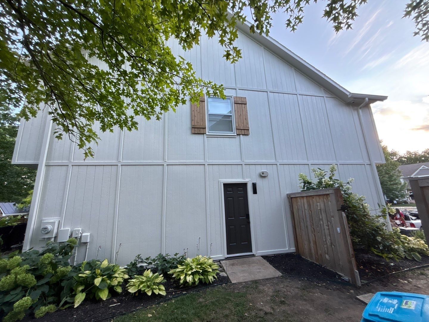 Shoji White Exterior Painting and Comprehensive Wood Rot Repair in Overland Park by Cougar Painting