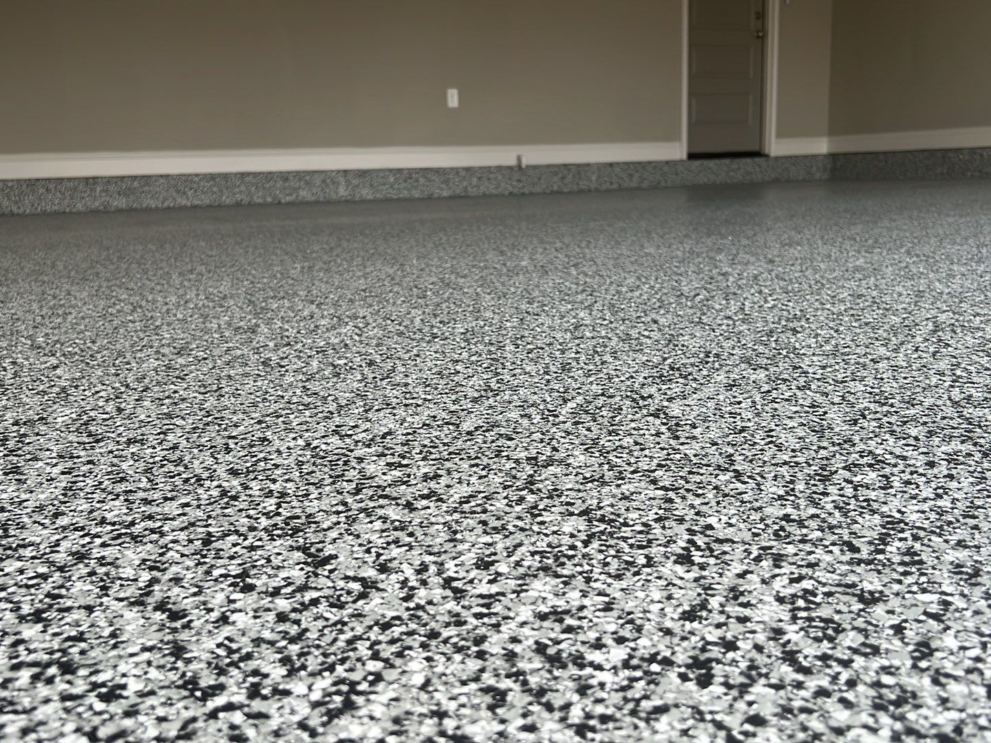 Domino Does It!  by Deese Elite Concrete Coatings