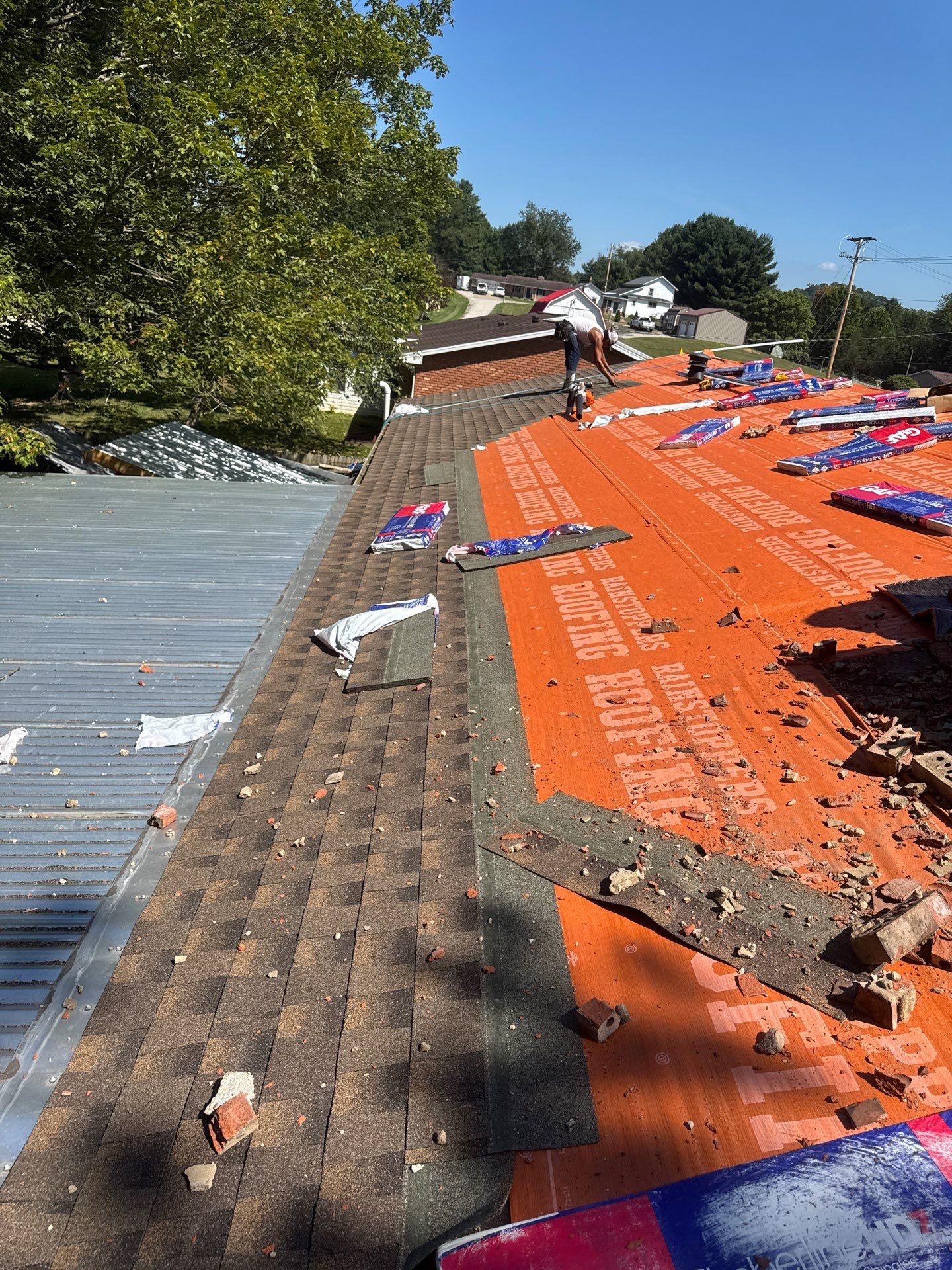 Residential Roofing Installation using GAF Timberline HDZ Charcoal by Rainstoppers Roofing