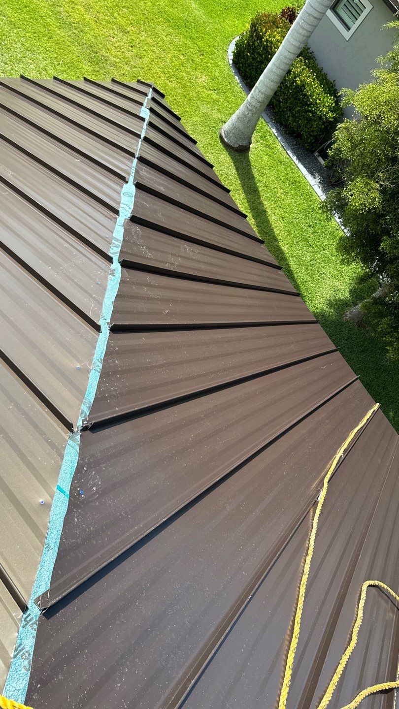 Residential Roofing Installation using Standing Seam Metal Roof in Cape Coral, FL by International Roofing