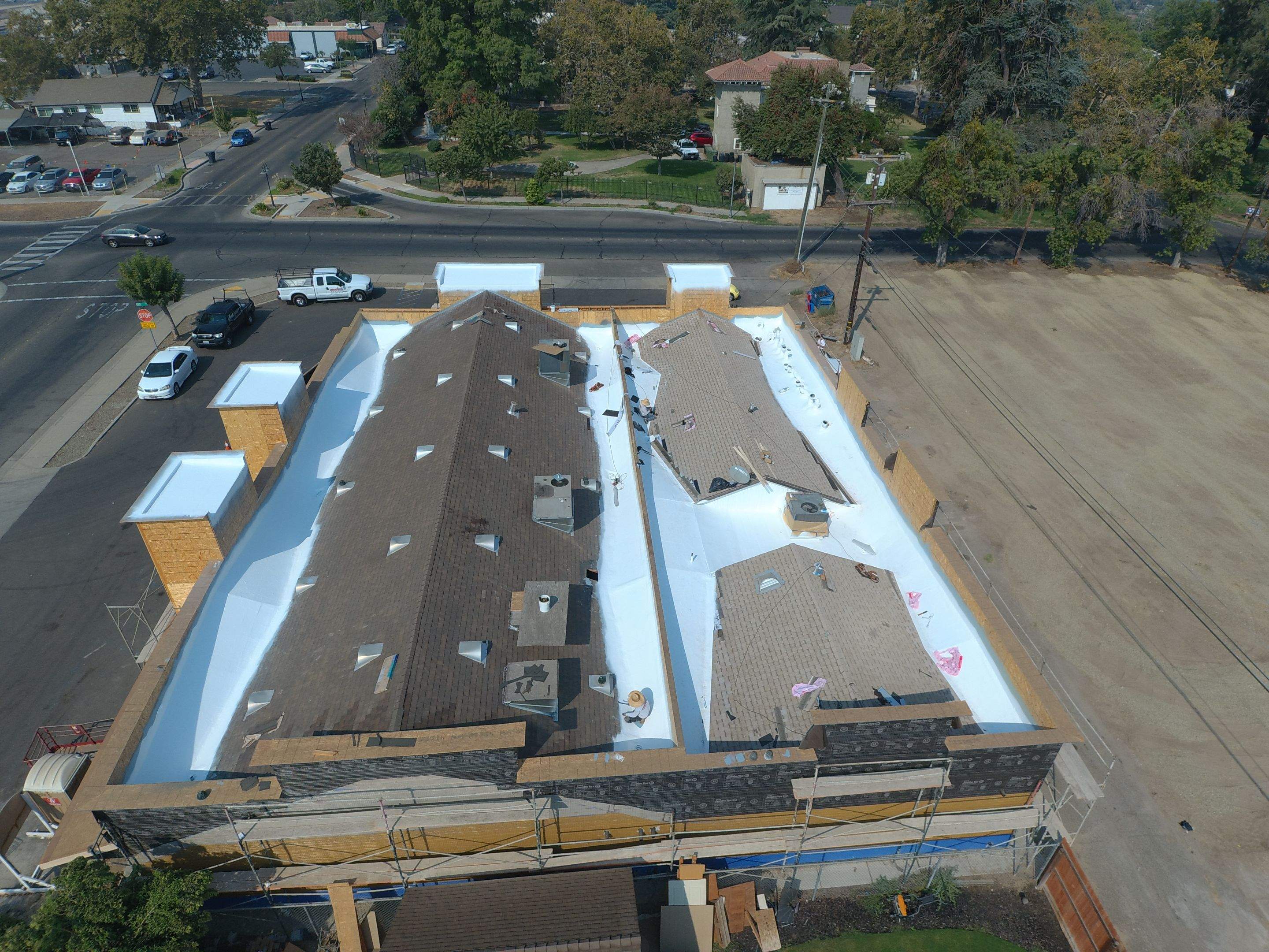 Spray foam and coatings using Conklin Benchmark/PUMA XL coatings and spray foam by Straight Edge Roofing Inc