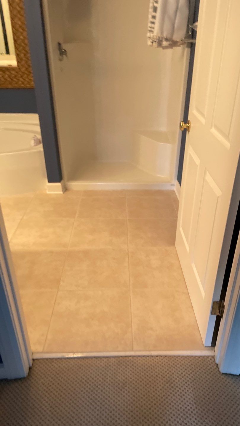 Bathroom Remodel using Tile by Footprints Floors of Coastal Carolina