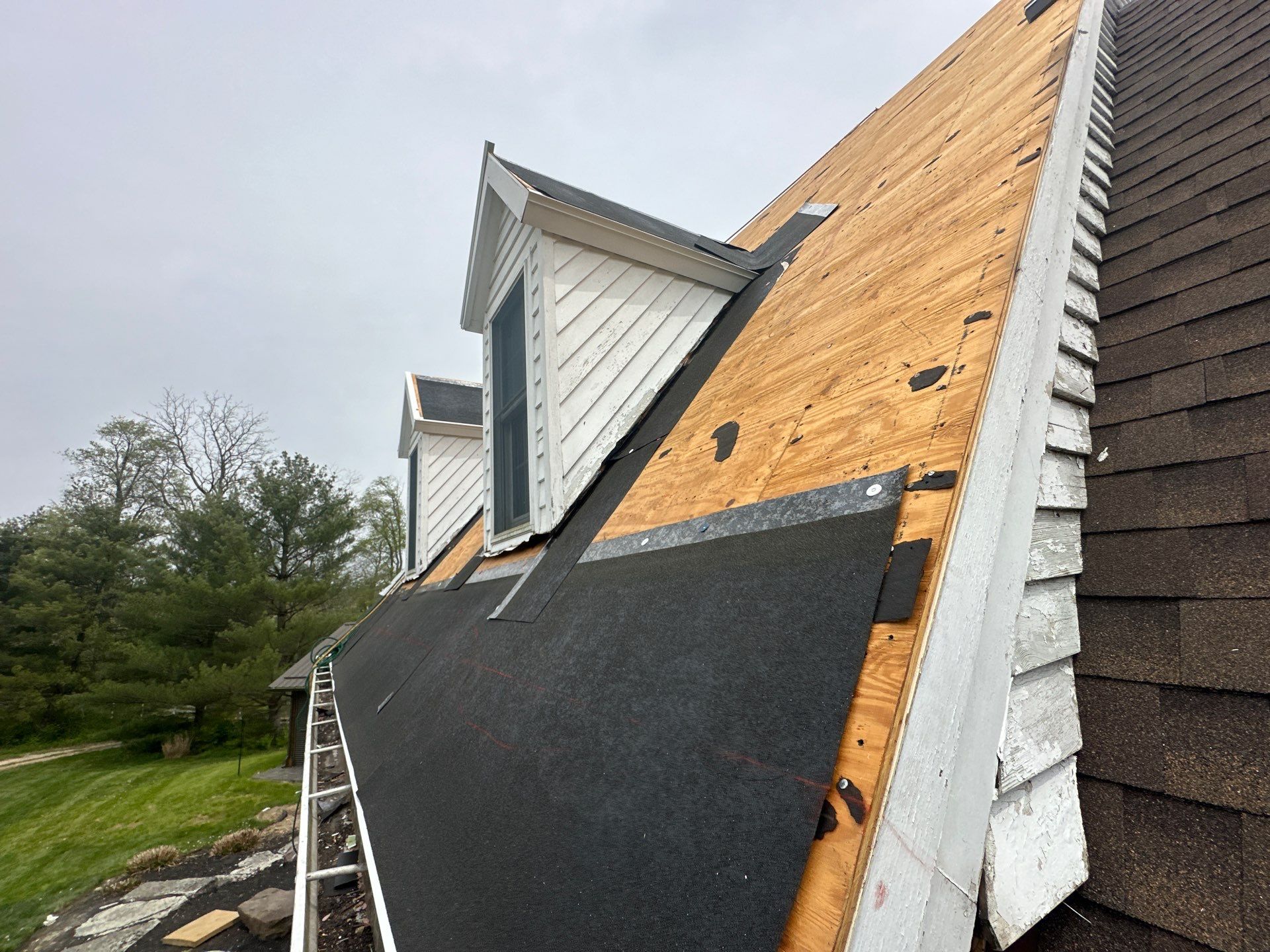 Residential Roofing Installation using Timberline HDZ Shingles - Barkwood by RoofX 