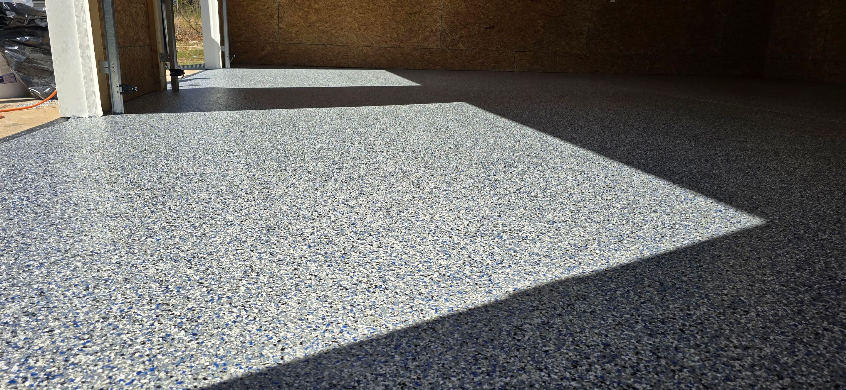 Garage using Tidal Wave by Elite Floor Solutions