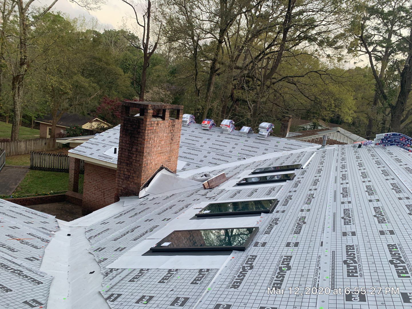 Residential Roofing Installation using Roof Replacement by American Roofing & Construction LLC
