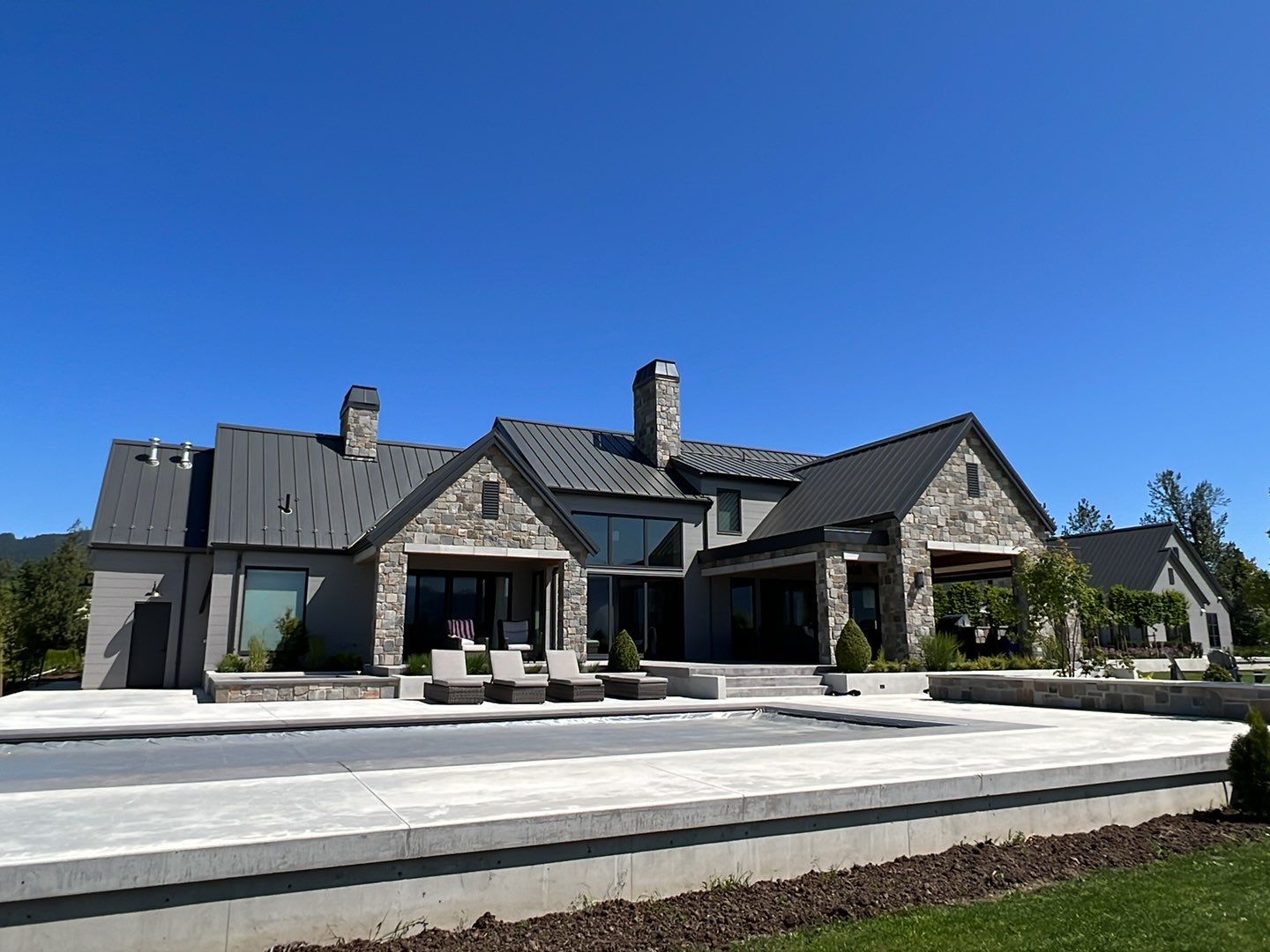 Residential Roofing Installation using 12" Prolok metal  by Top Notch Roofing Inc