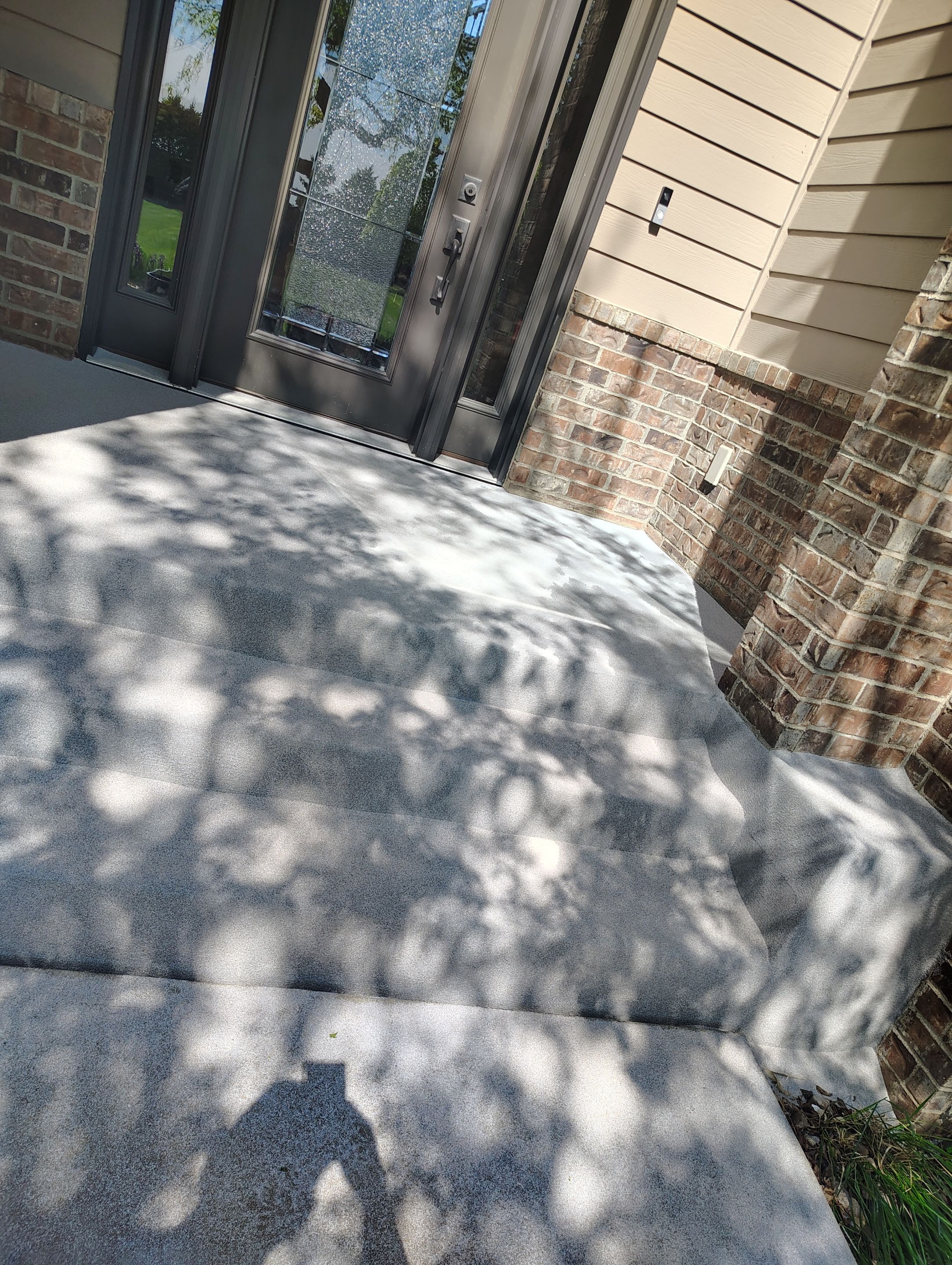 Front Porch Concrete Coating and Restoration in Harrisburg by Select Painting, Coatings & Garage Cabinets