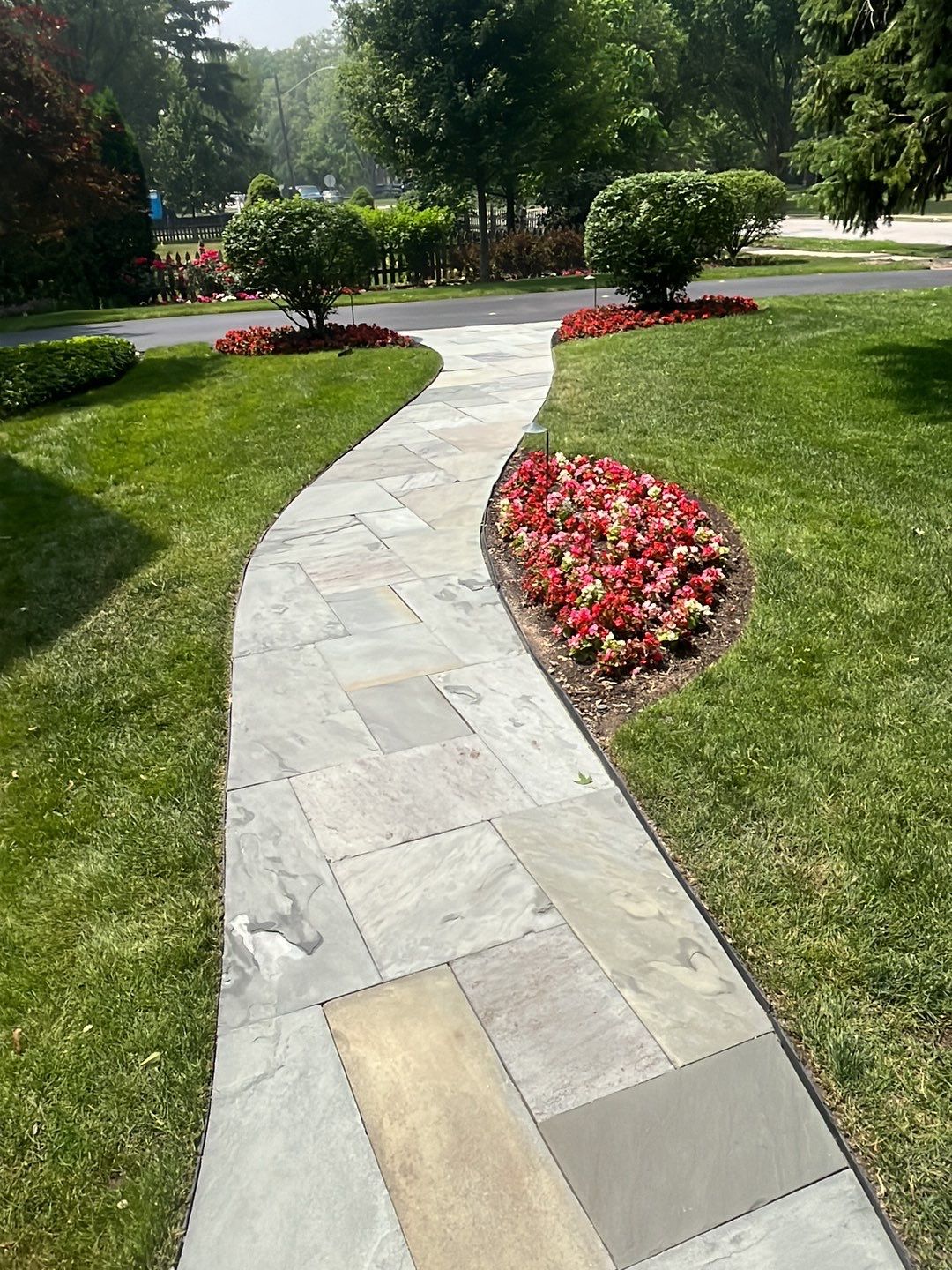 Northbrook, IL stucco home soft wash and stone cleaning by Northern Power Washing LLC.