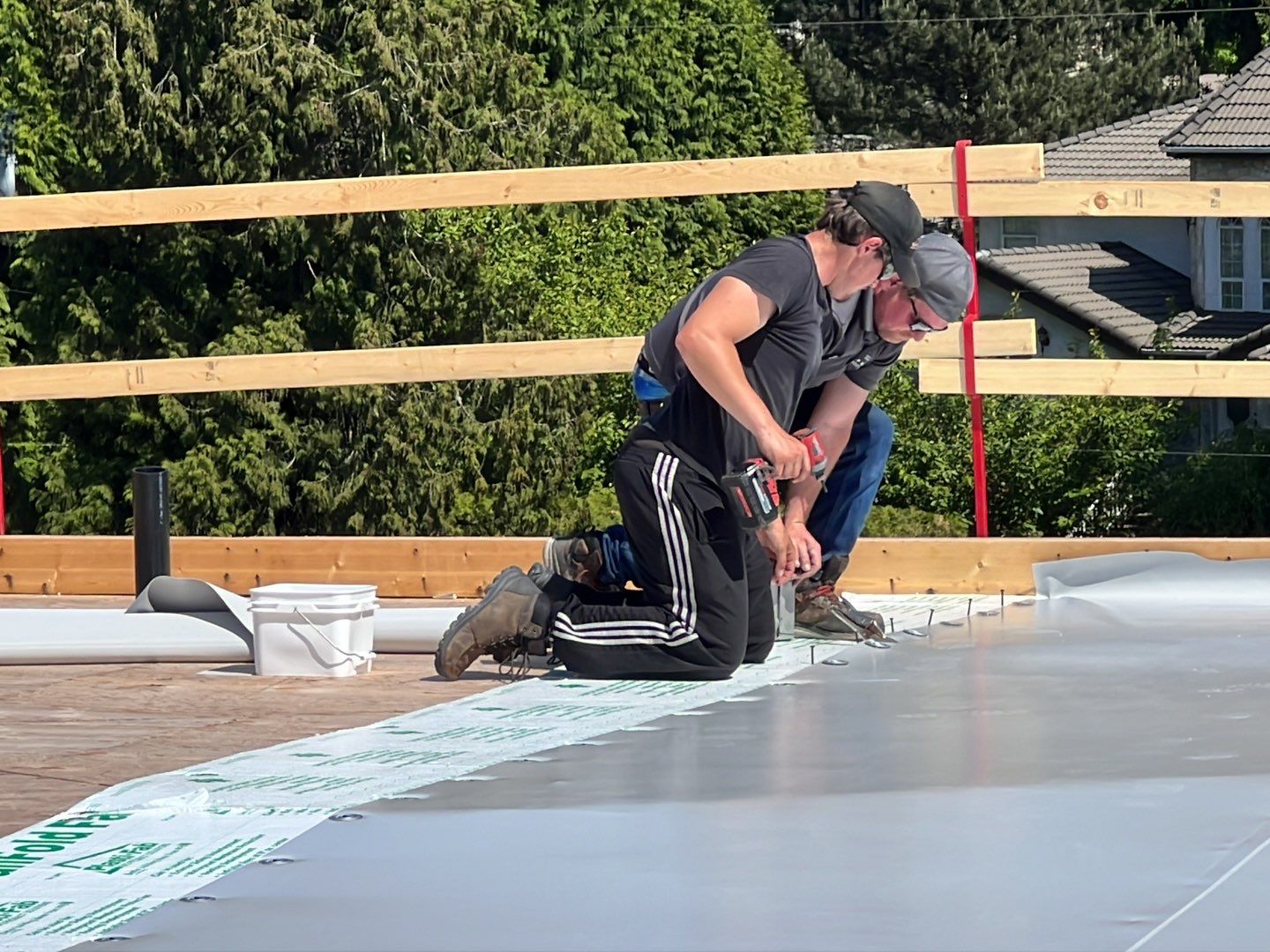 Residential Roofing Installation using Durolast roofing membrane by Top Notch Roofing Inc