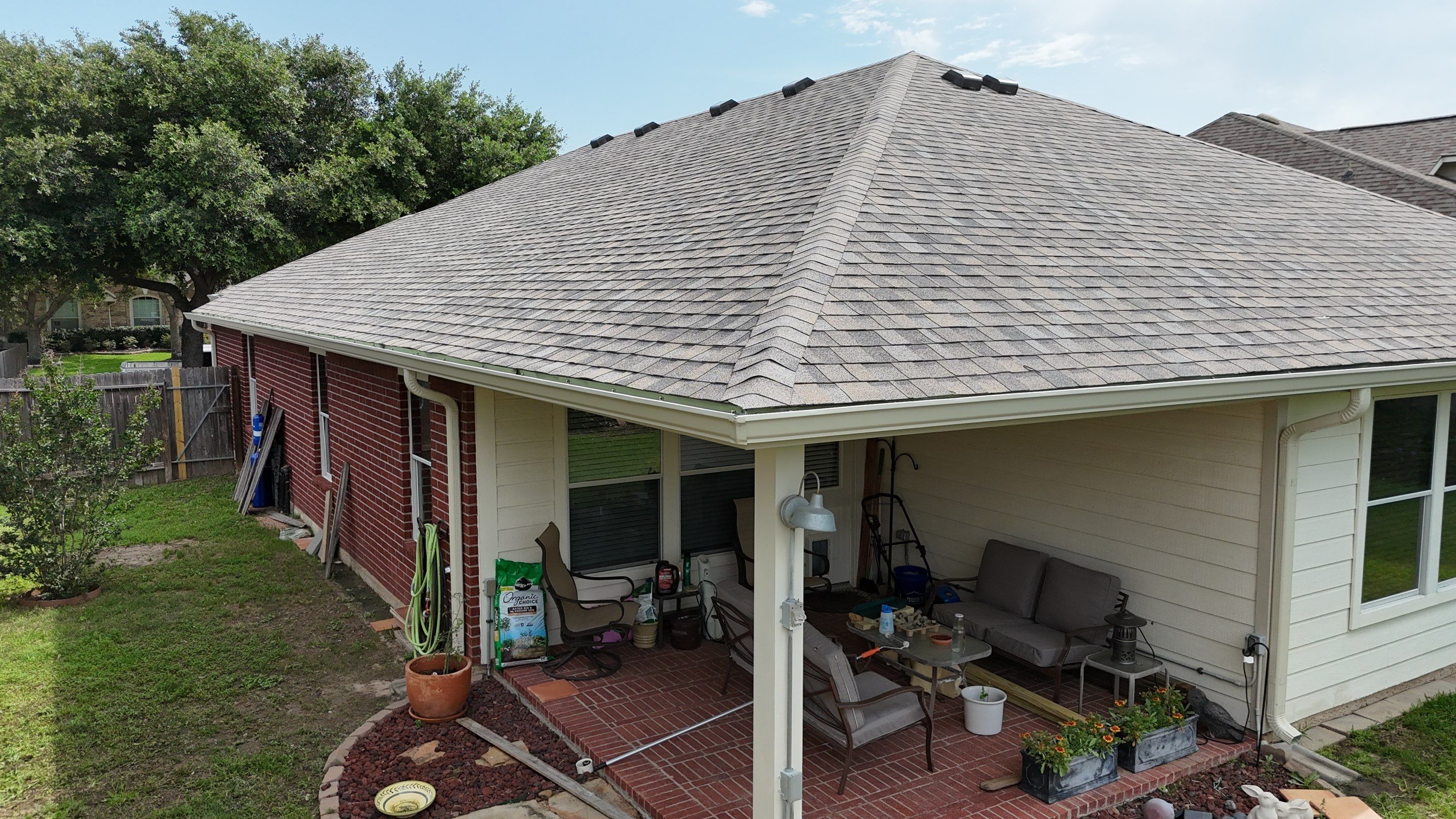 Residential Roofing & Gutter Installation using IKO Dynasty by Core Four Roofing