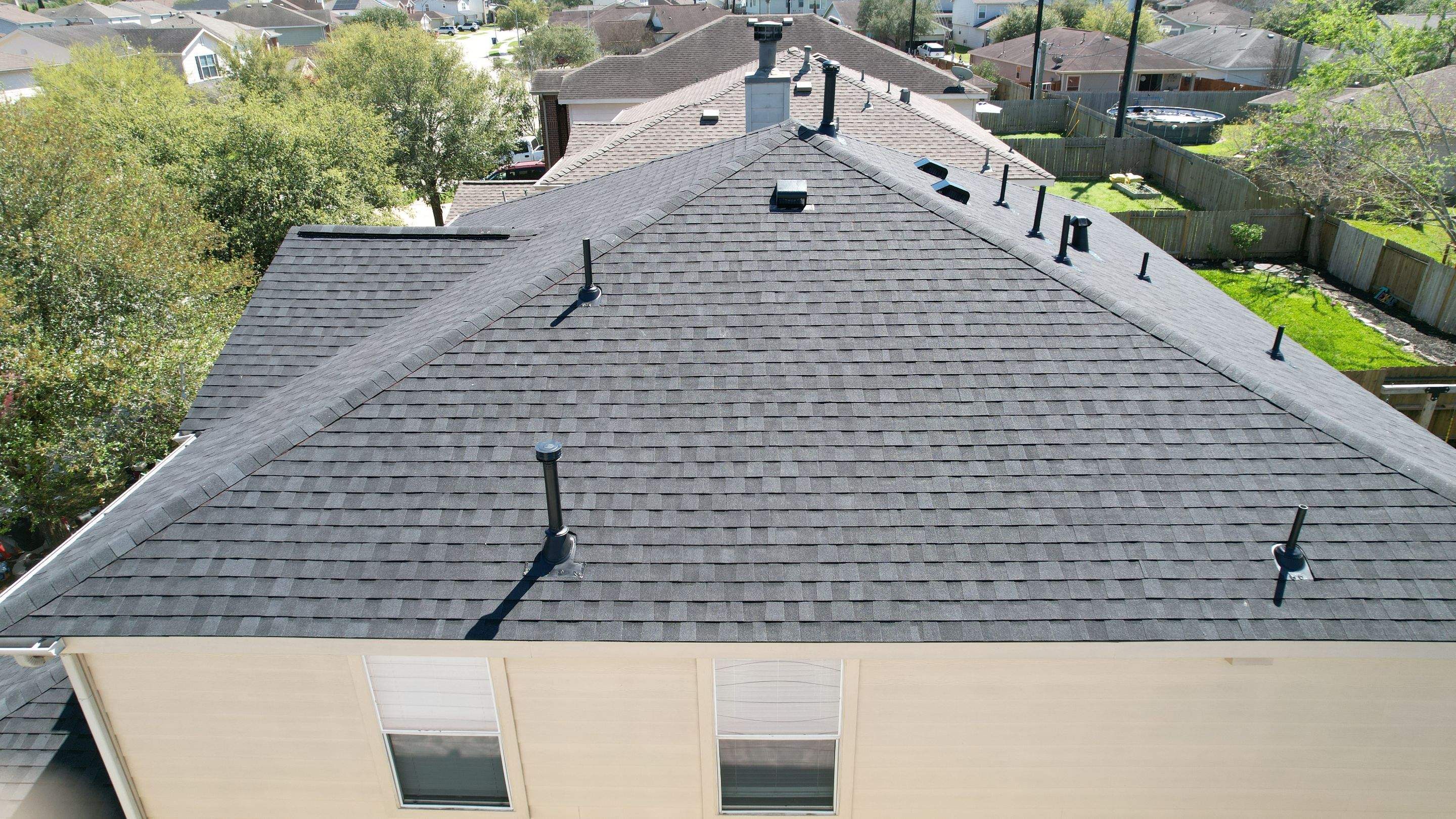 Complete Charcoal-Gray Roof Replacement — Spring, TX by PL Roofing & SB Roofing, LLC.