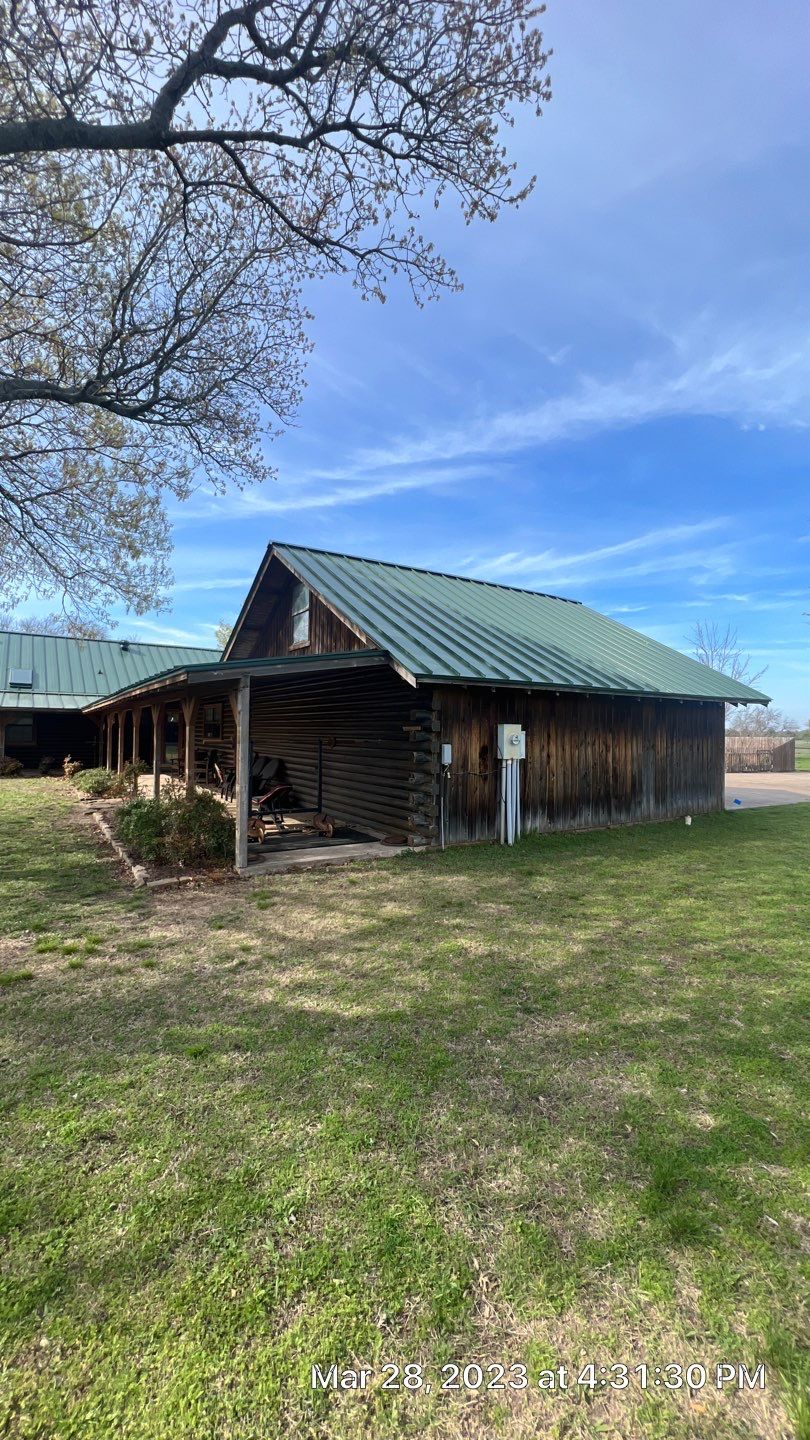 Shingle to Standing Seam Metal Roof by Springtree Restoration
