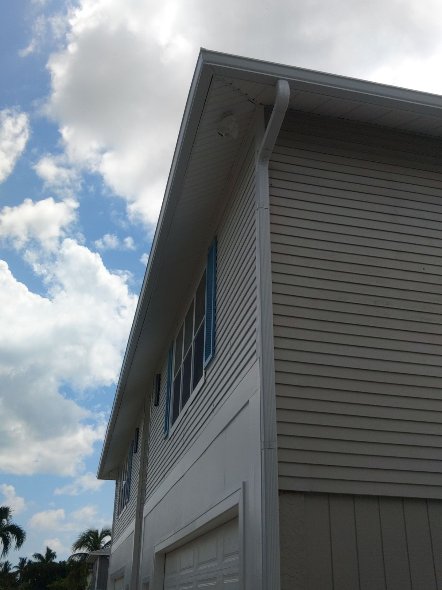 Complete Gutter System with Downspouts & Guards in Fort Myers Beach FL by Gutter Professors