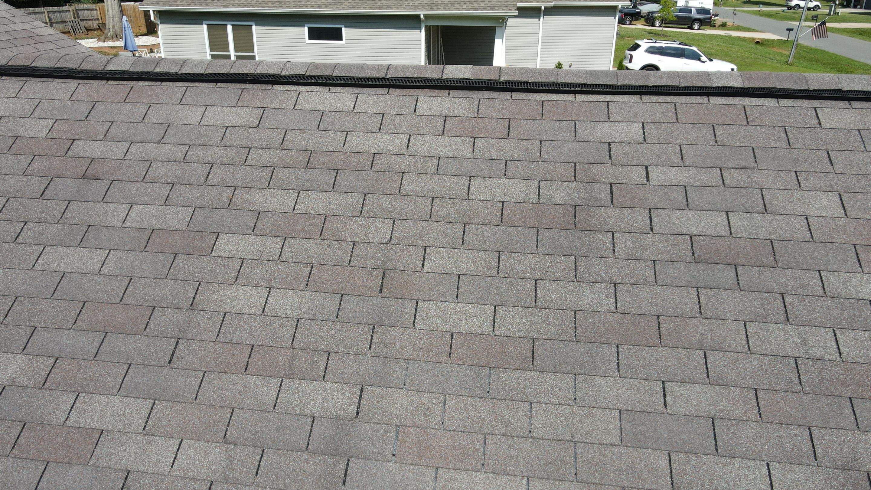 Residential Roofing Installation using Owens Corning Oakridge Onyx Black by RISE Roofing & Restoration, LLC