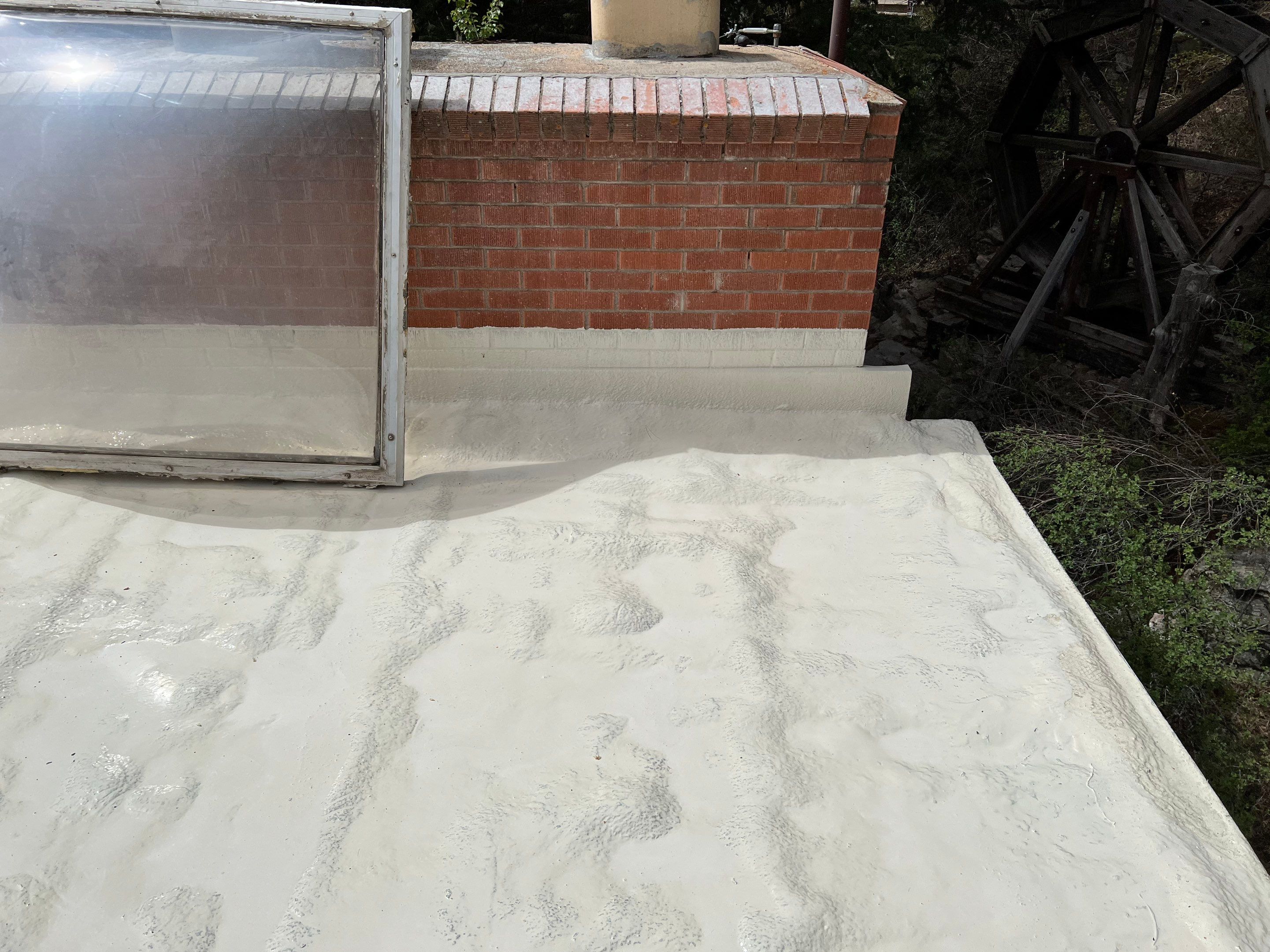 Commercial Roofing Installation using CASTAGRA ECODUR COATING by A to Z Roofing