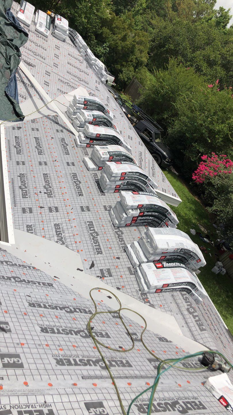 Residential Roofing Installation using Roof Replacement by American Roofing & Construction LLC