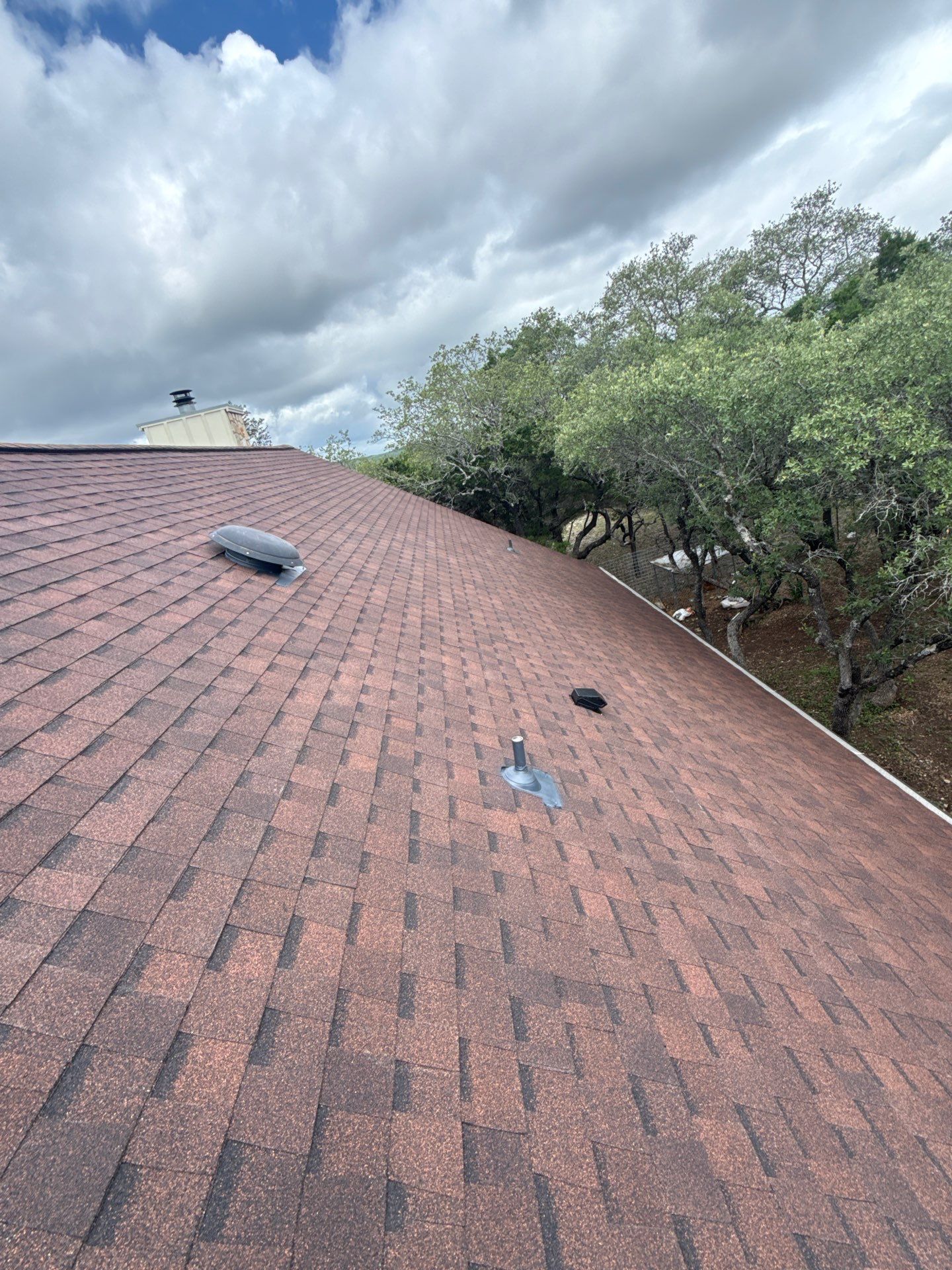 Residential Construction using TAMKO - Titan XT - Rustic Hickory by Action Exteriors Austin