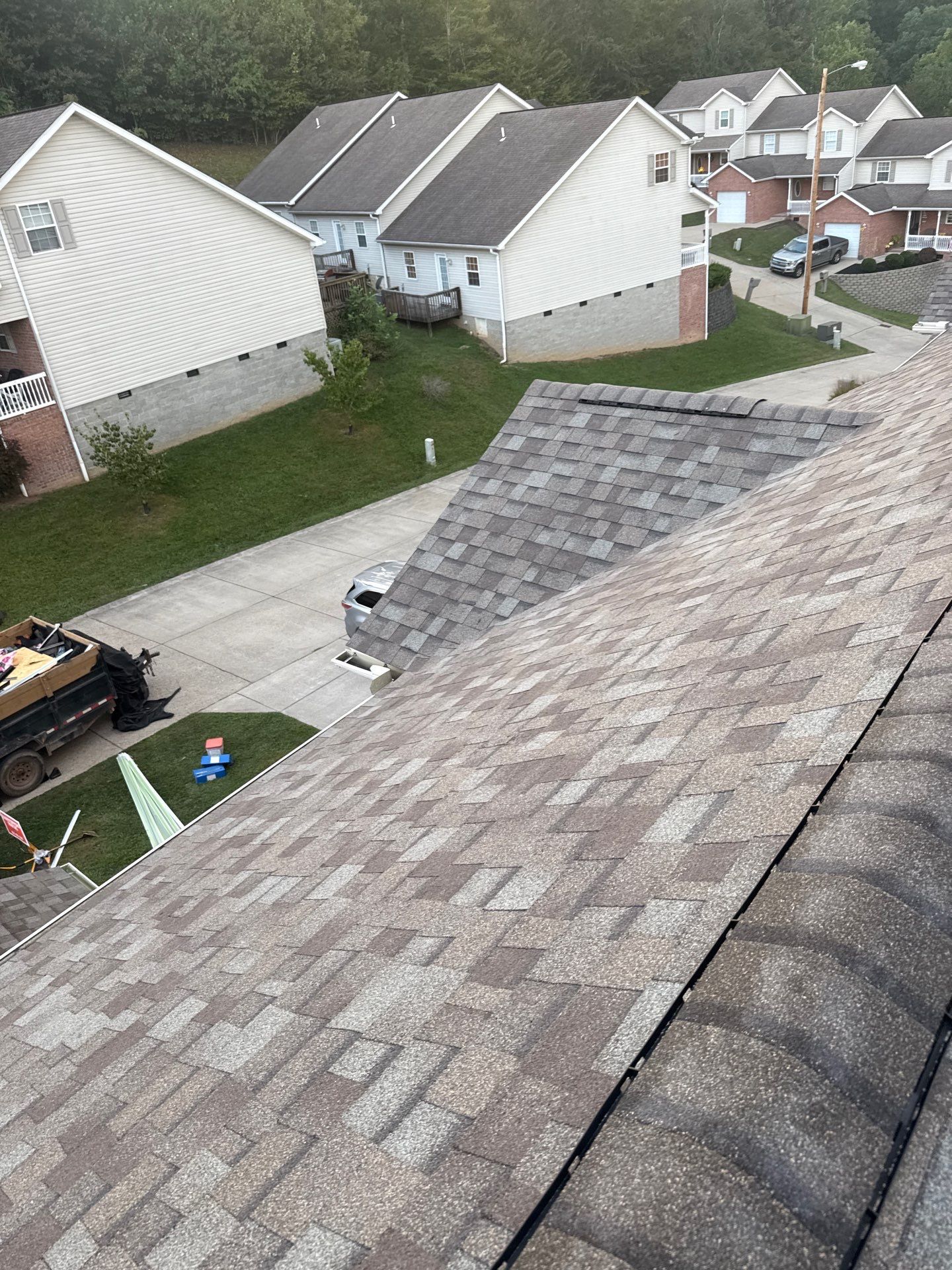 Residential Roofing Installation using Driftwood by Rainstoppers Roofing