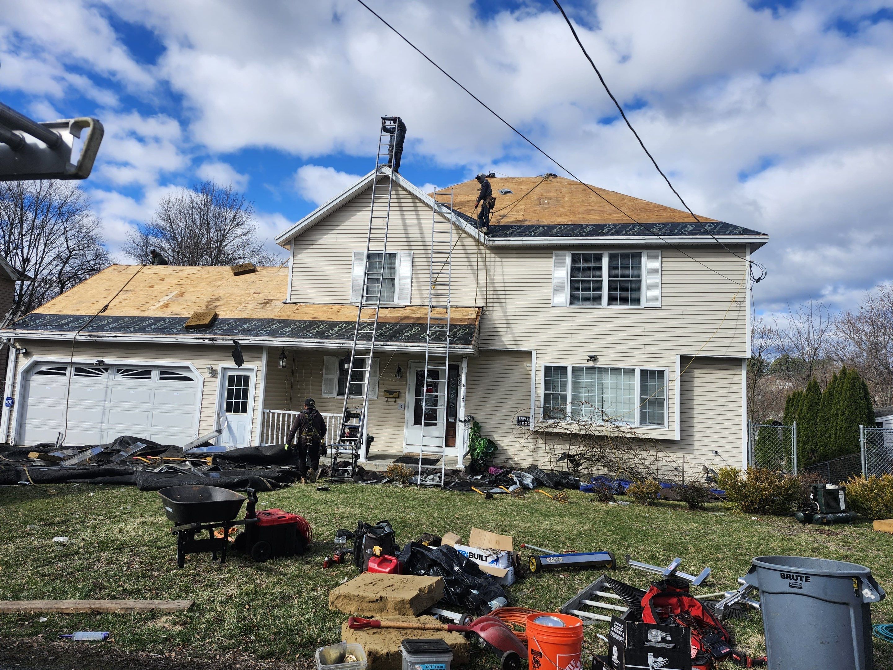 Full Roof Replacement + Seamless Gutters by Mighty Dog Roofing of Greater Middlesex County