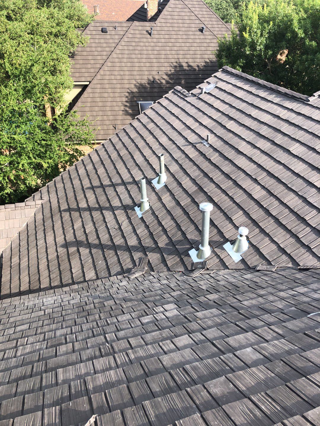 Designer Residential Roof with Zip System by Springtree Restoration