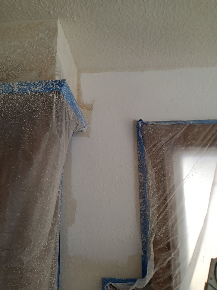 Interior and exterior painting project by Roof Concepts Construction