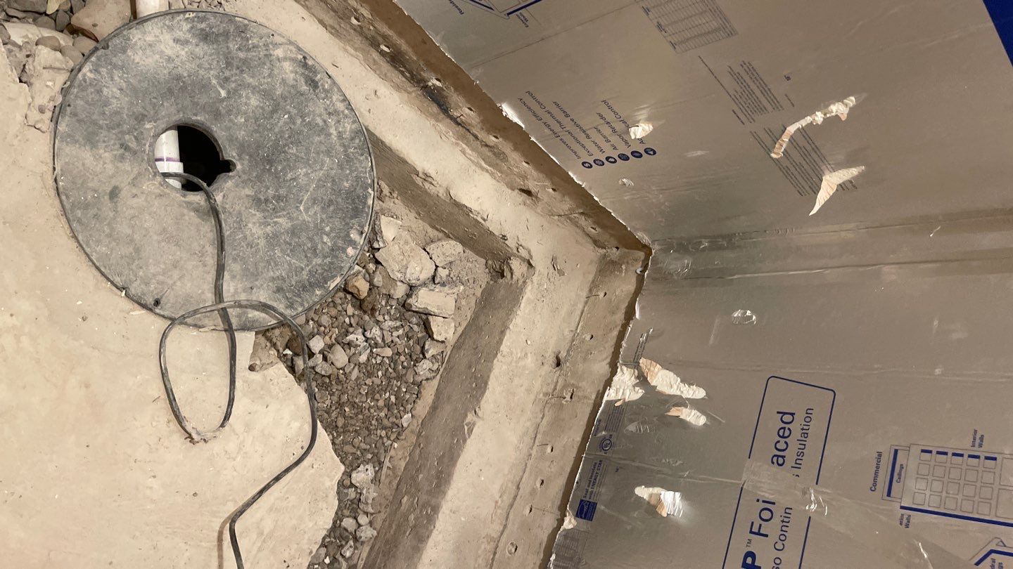 Interior Drain Tile & Buried Discharge in St. Anthony, MN by Waterproofing Northeast