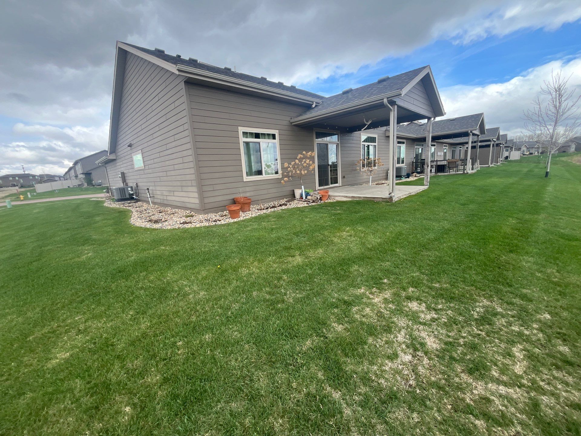 Exterior Painting for Multi-Unit Townhomes in Sioux Falls by Select Painting, Coatings & Garage Cabinets