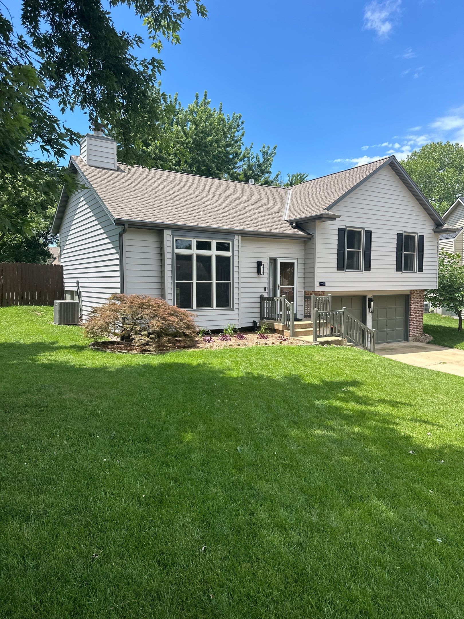 Whole-Home Craneboard Siding Replacement and Exterior Renovation in Shawnee by EEC Windows, Siding & Roofing