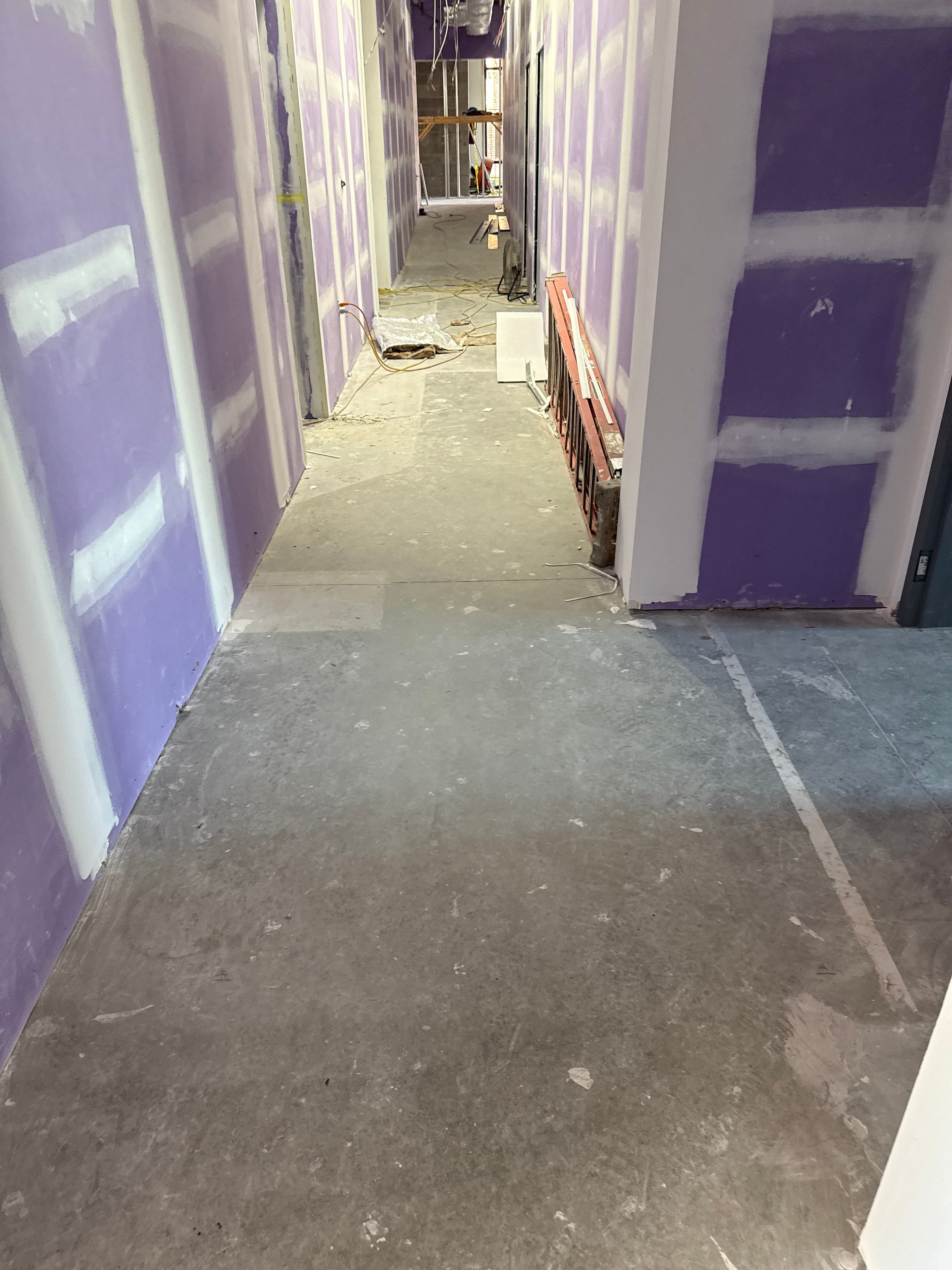 Industrial Epoxy Flake and Concrete Overlay Floor Installation in Pensacola by Cornerstone Hard Surface Restoration