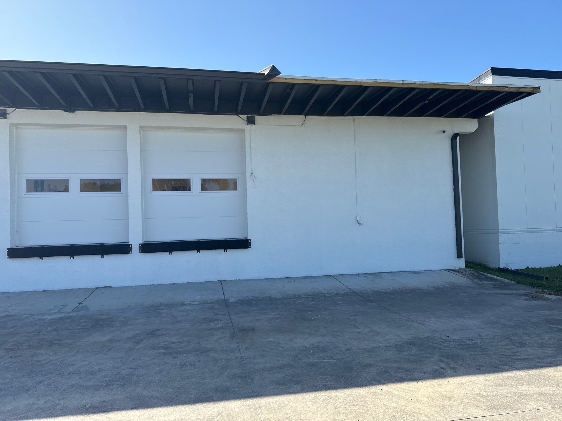 Black Seamless Gutters for Modern Homes in Sarasota FL by Gutter Professors