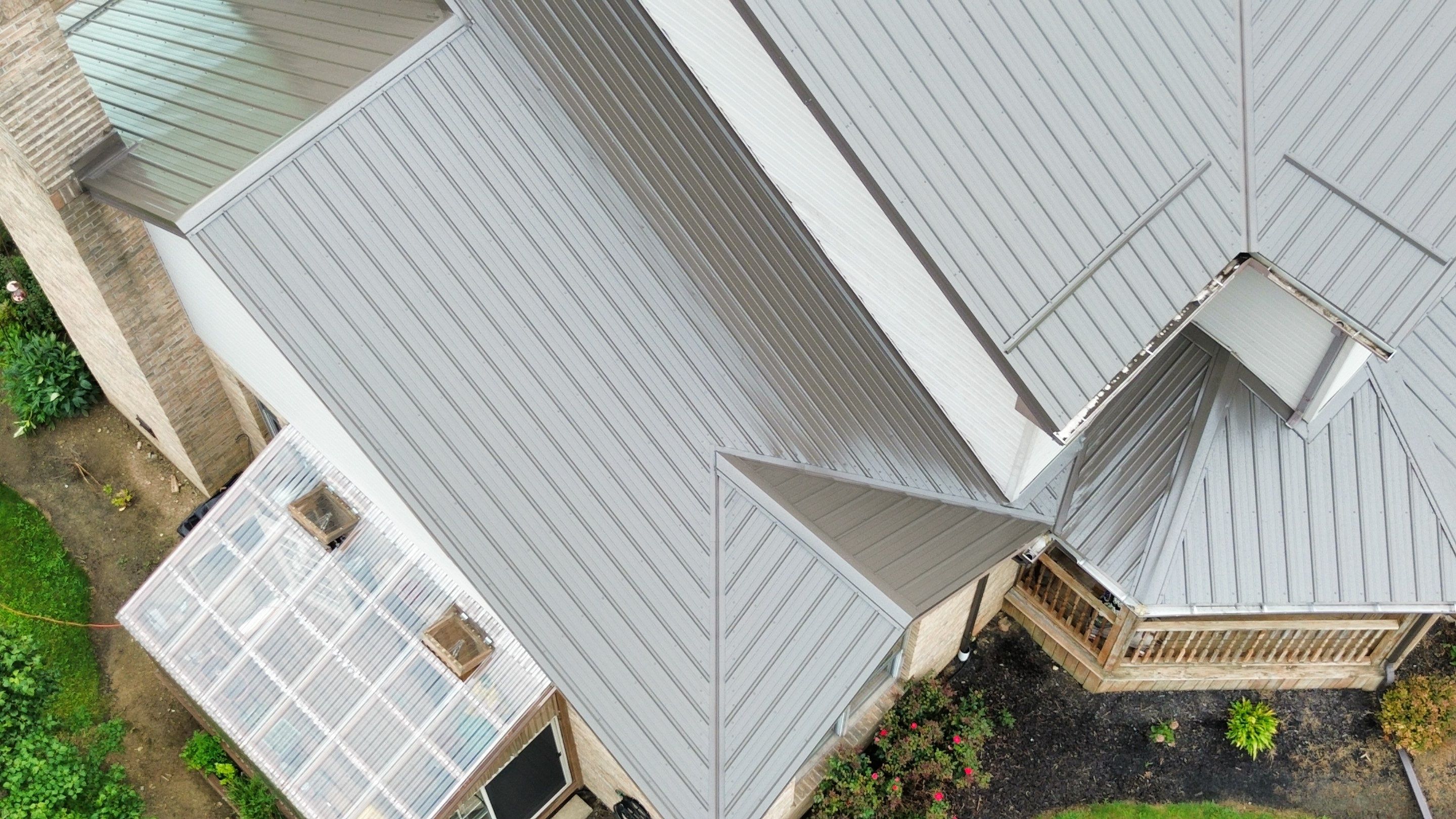 Residential Roofing Installation using Performance Panel Metal - Burnished Slate by RoofX 