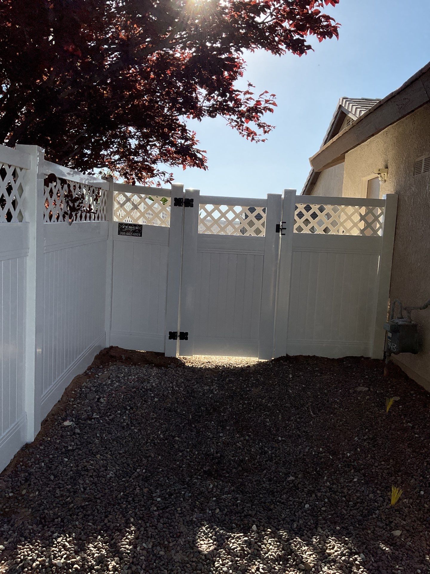 Lattice Vinyl with Privacy Vinyl Fence by Fence Guys Inc.