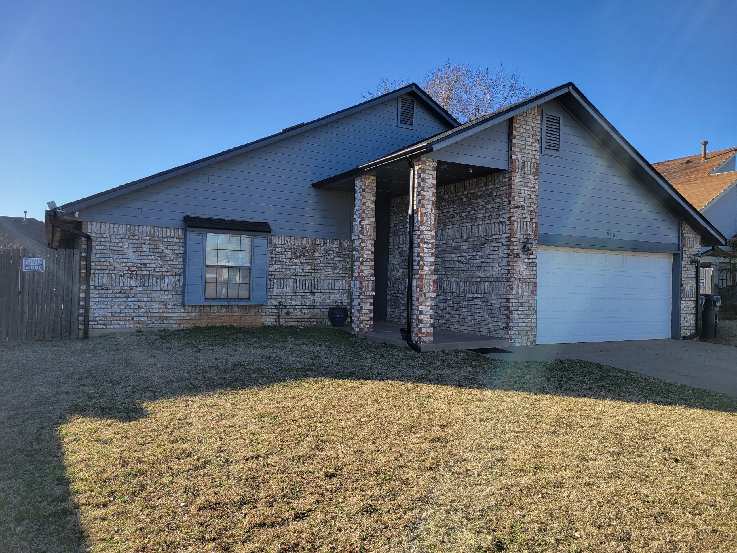 roof replacement & skylight installation & gutter installation in Oklahoma City by McCann's Roofing and Construction