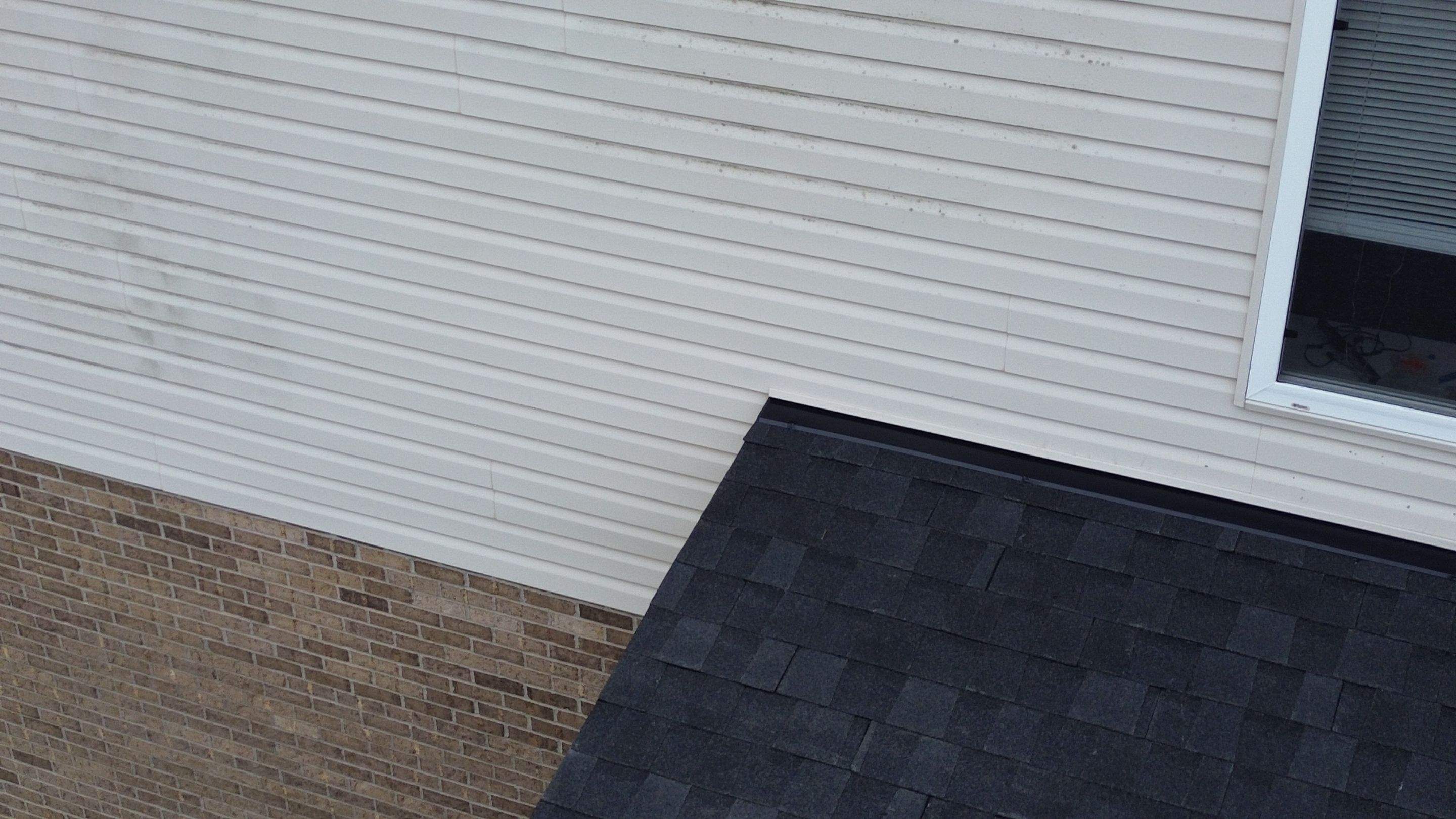 West Hamilton - Pristine Black & Gutters by Tamlin Roofing
