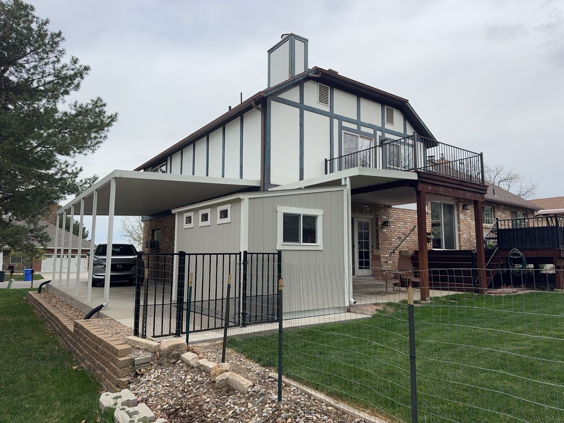 Cottonwood Heights | Custom Hardie Exterior & Bold Fascia | Cobble Stone Accents by Ideal Siding Utah