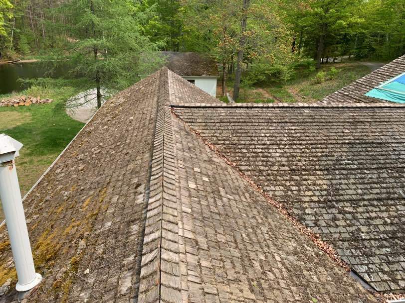 Residential Roofing Installation using 24 Ga Standing Seam Meta by Jay Carter Roofing & Sheet Metal