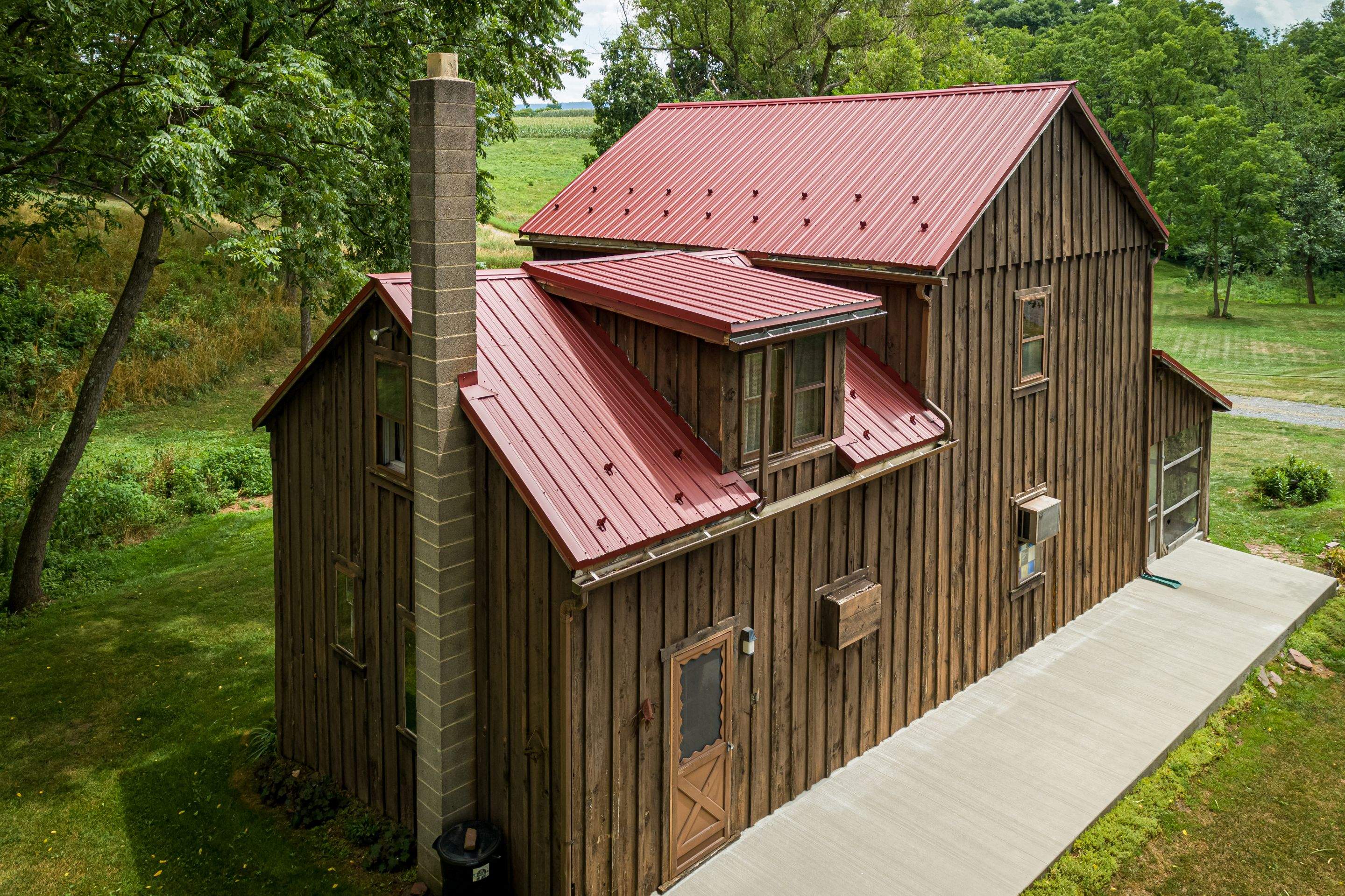 Metal Roof-colonial red by Esh Builders