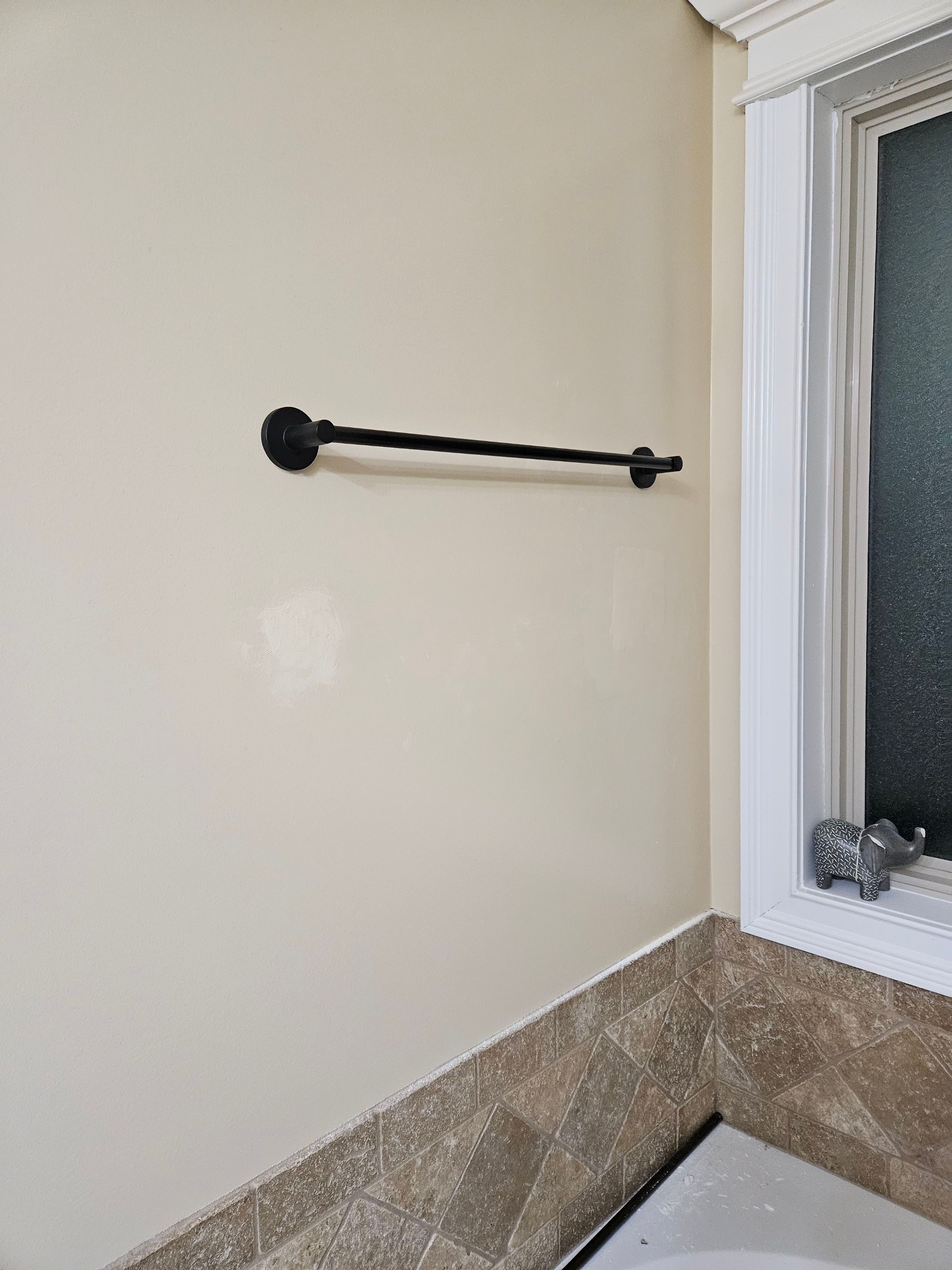 Drywall/door/frame repair and towel hanger installation by Swift Signings and Services LLC